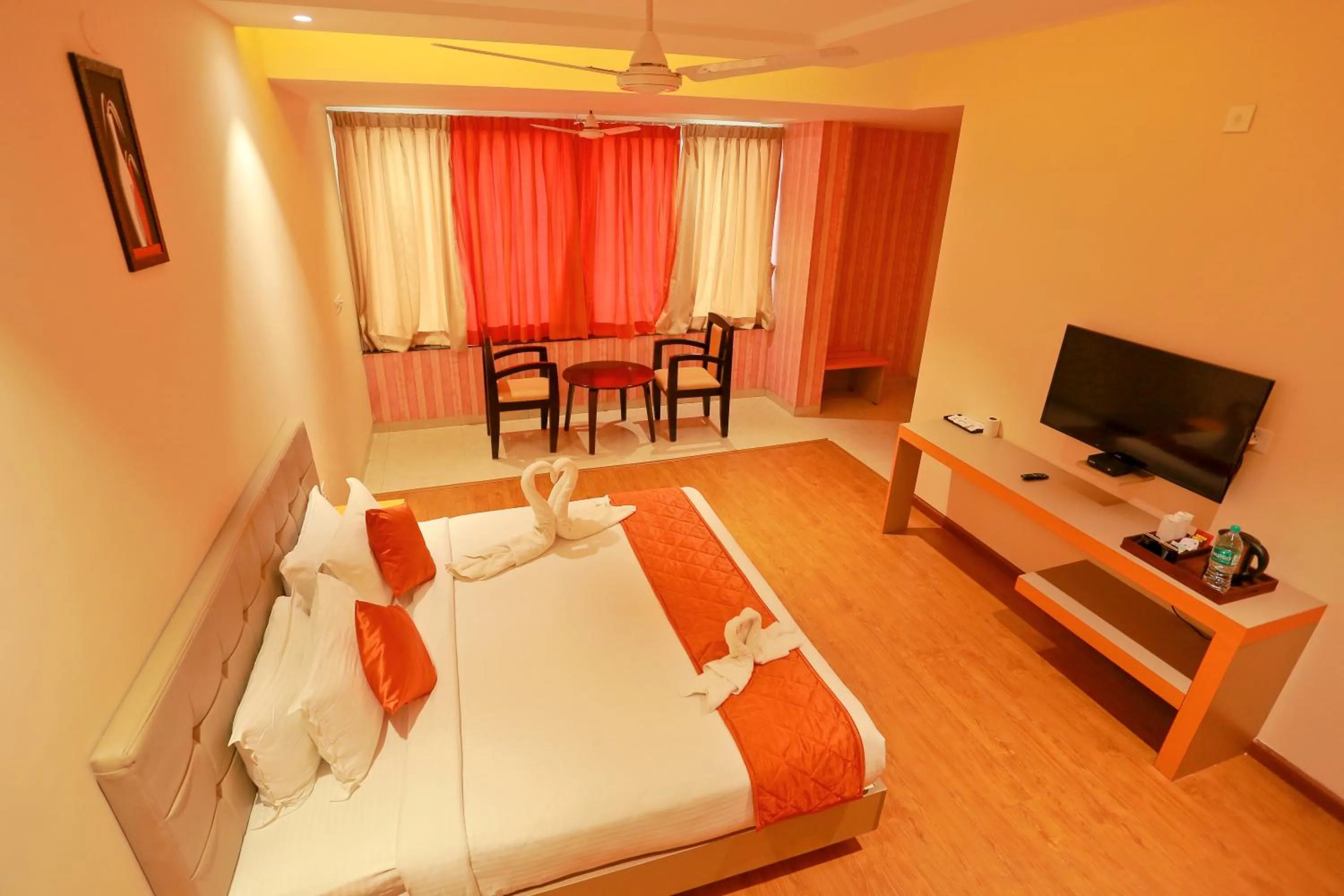 Bed in Grand Signature Hotel & spa