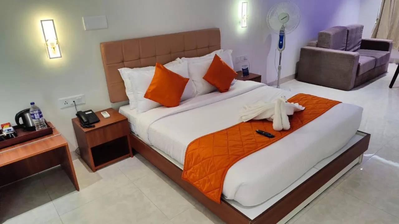 Bed in Grand Signature Hotel & spa