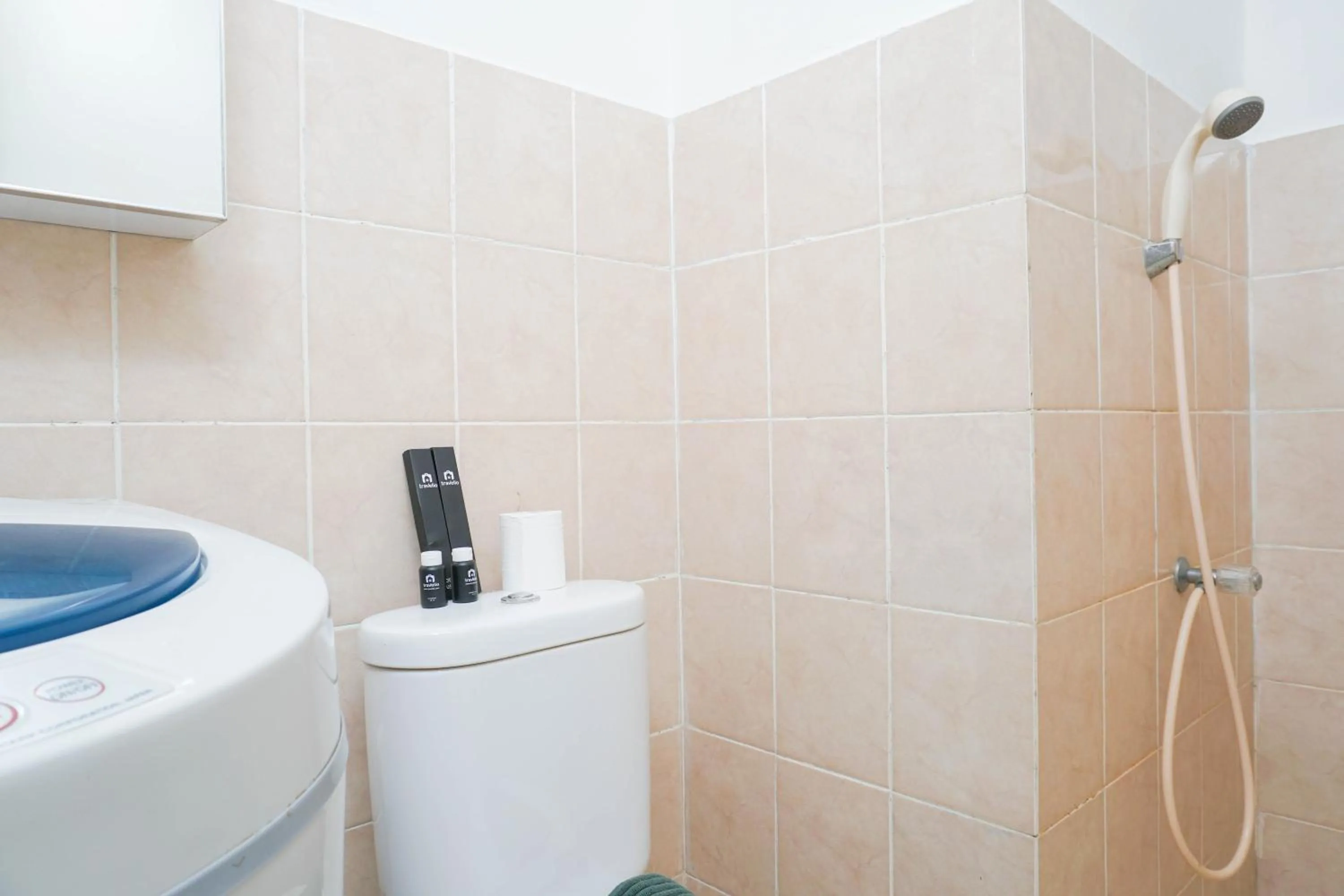 Spacious 2BR Green Bay Pluit Apartment By Travelio