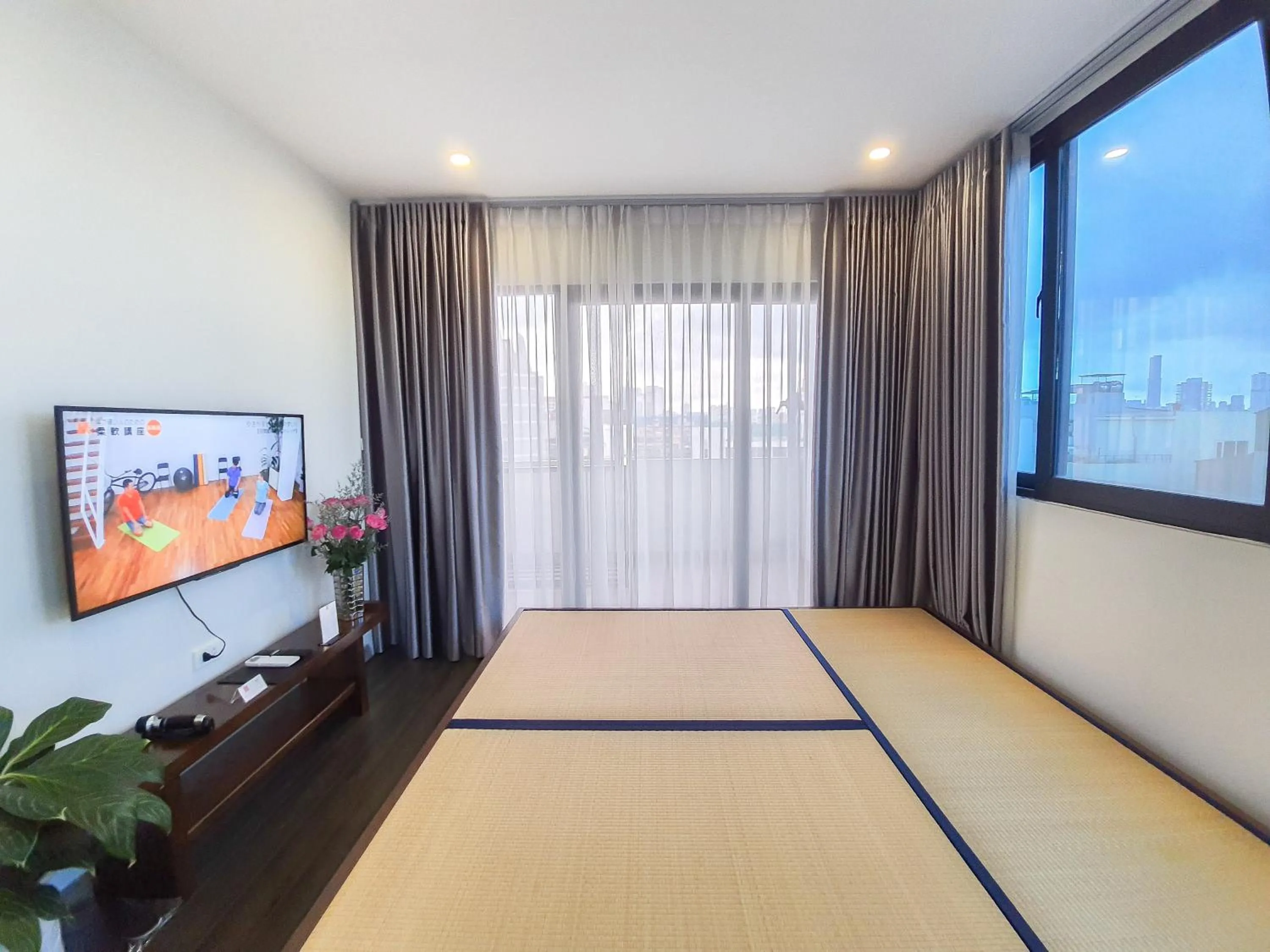 Living room, Bed in REIWA INN APARTMENT