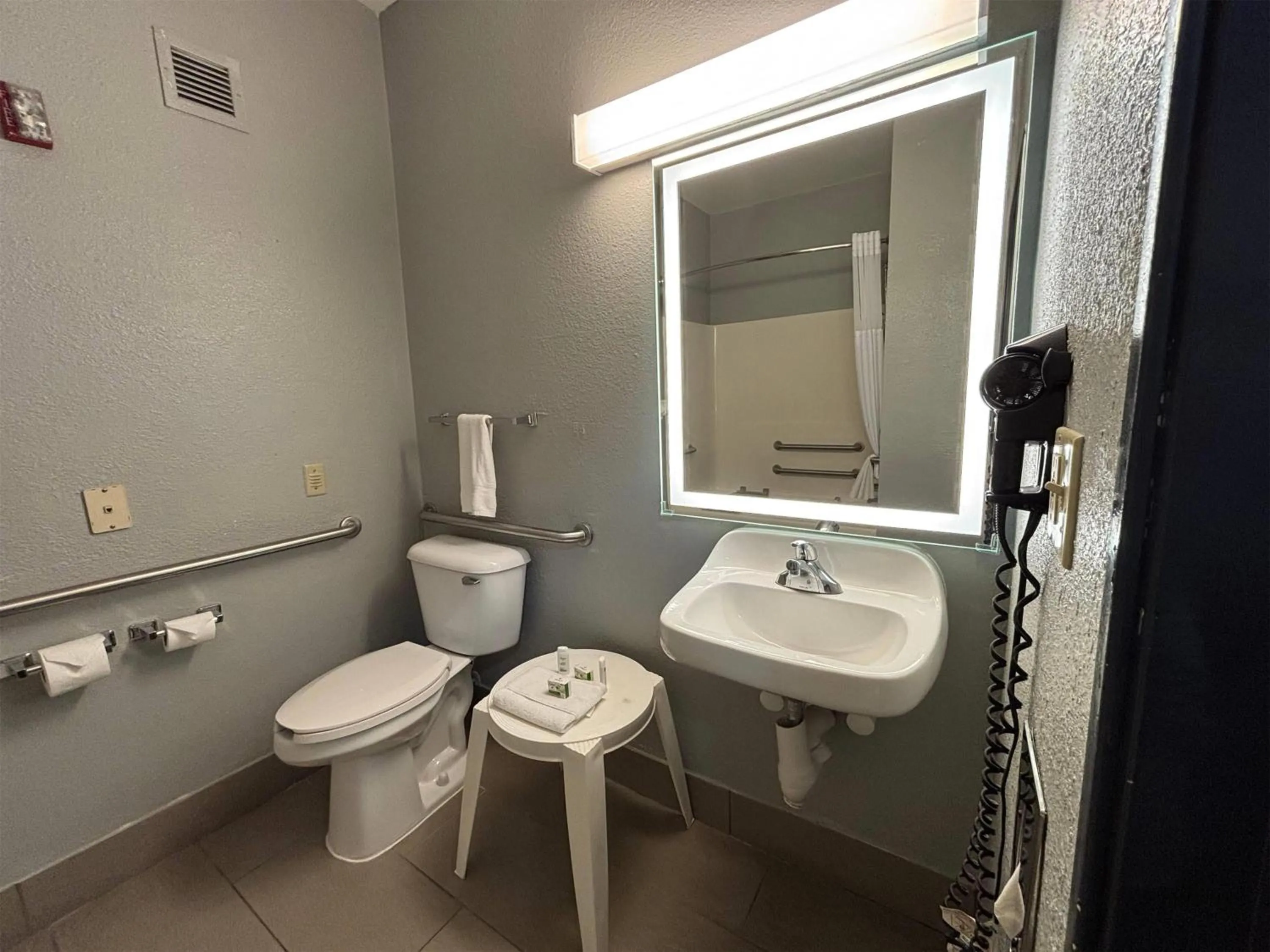 Bathroom in AmericInn by Wyndham, Galesburg, IL