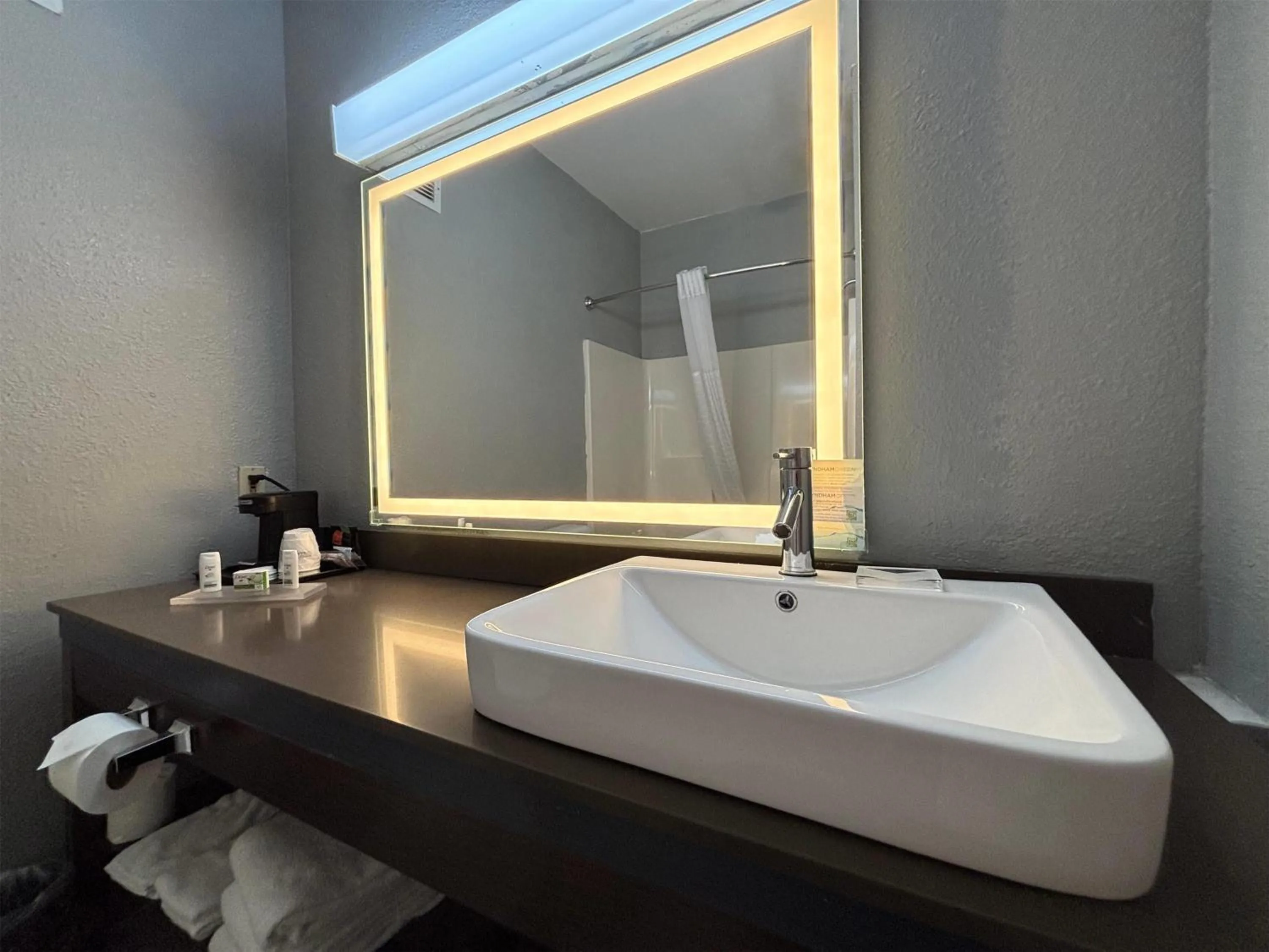 Bathroom in AmericInn by Wyndham, Galesburg, IL