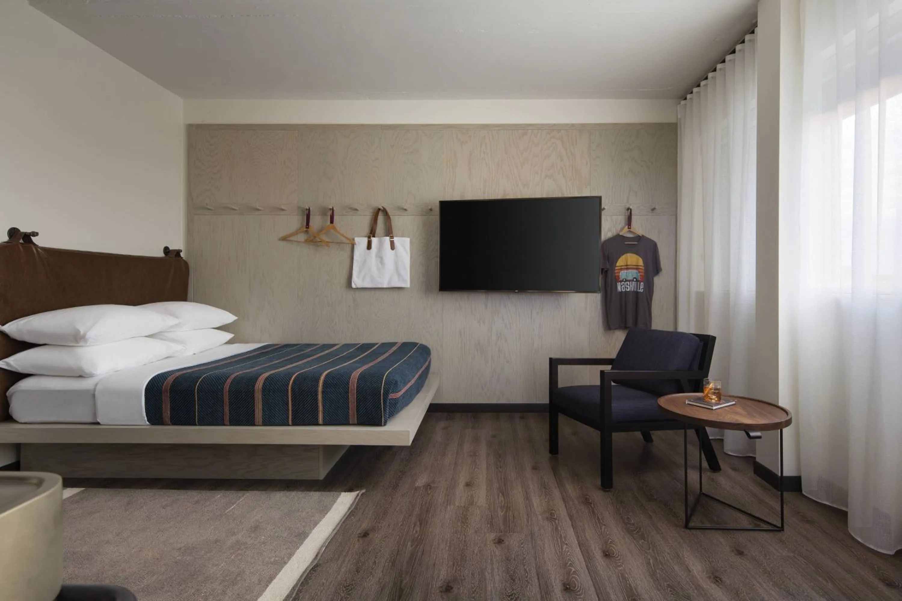 Photo of the whole room, Bed in Moxy Nashville Vanderbilt Area