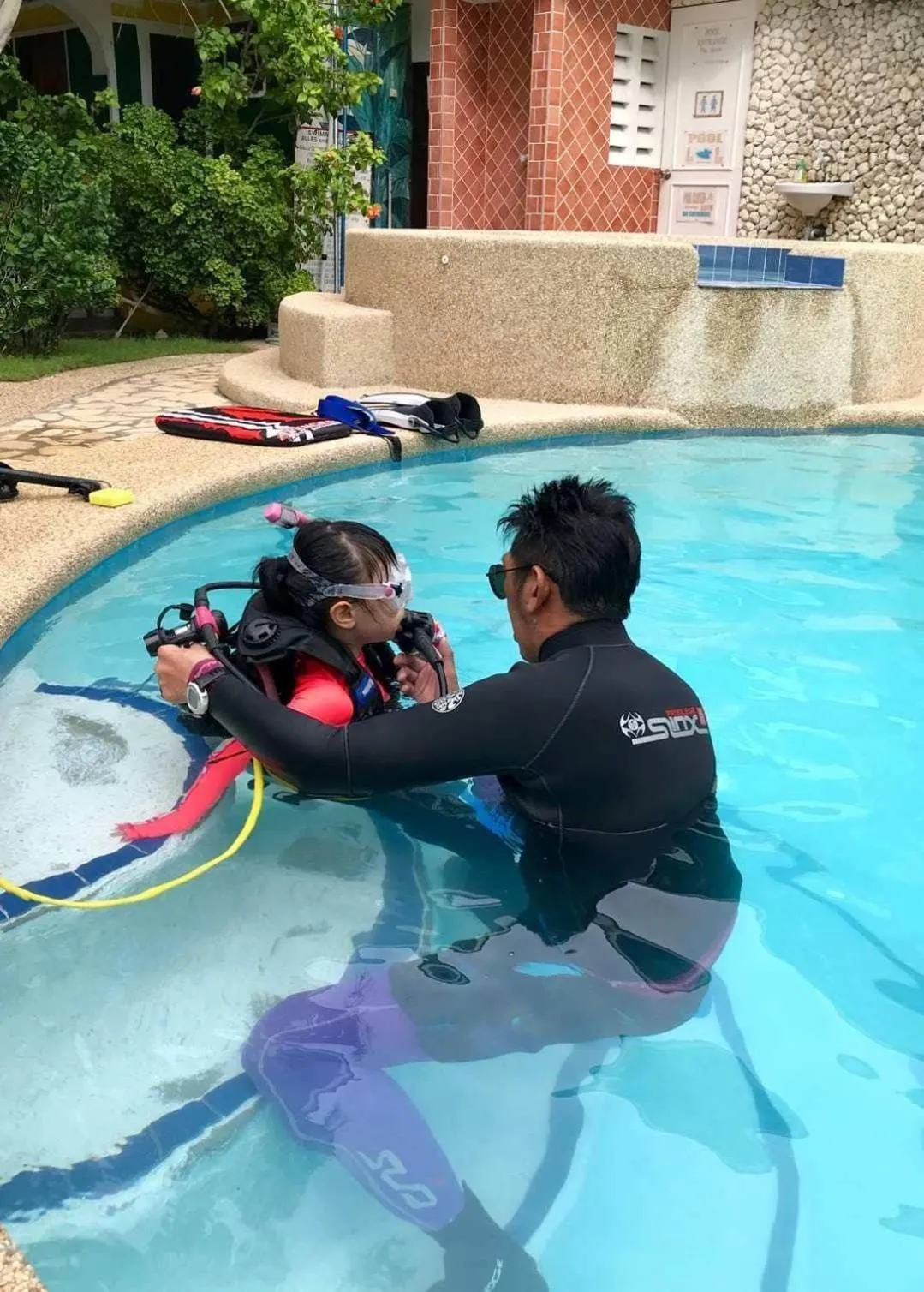 People in Love's Beach & Dive Resort