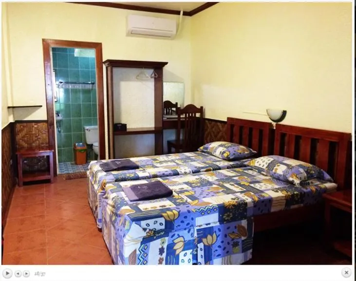 Bed in Love's Beach & Dive Resort