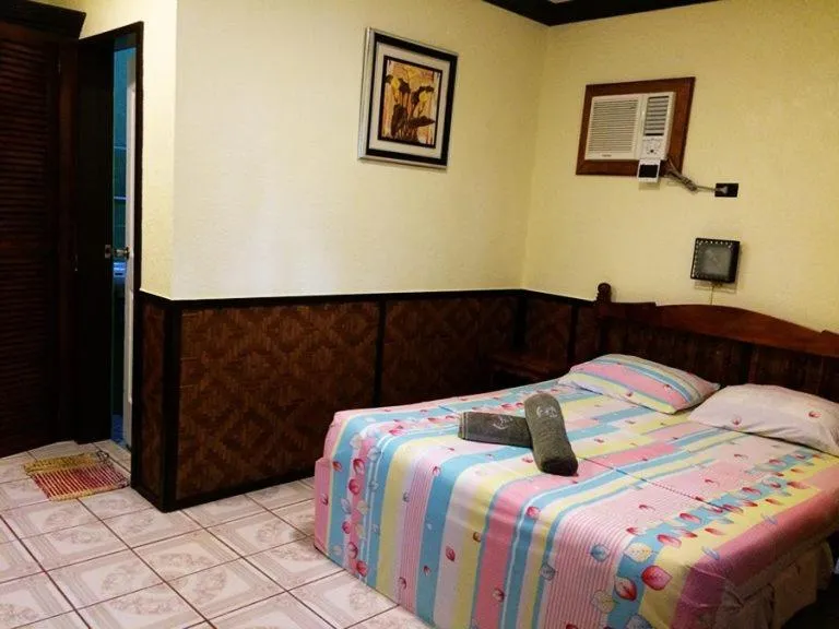 Bed in Love's Beach & Dive Resort