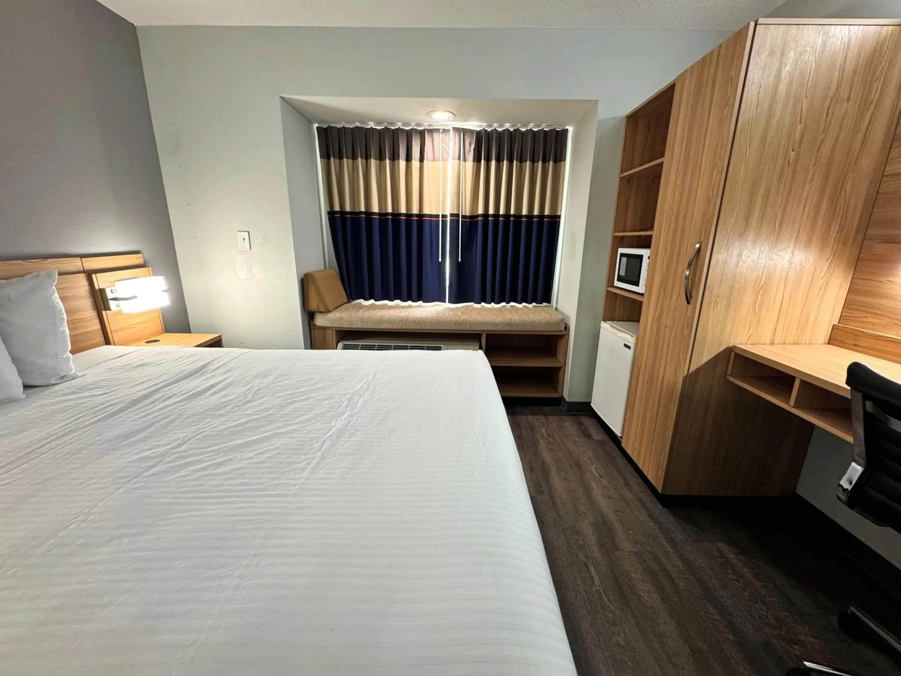 Photo of the whole room, Bed in Microtel Inn & Suites by Wyndham Tuscaloosa East Photo of the whole room, Bed in Microtel Inn & Suites by Wyndham Tuscaloosa East