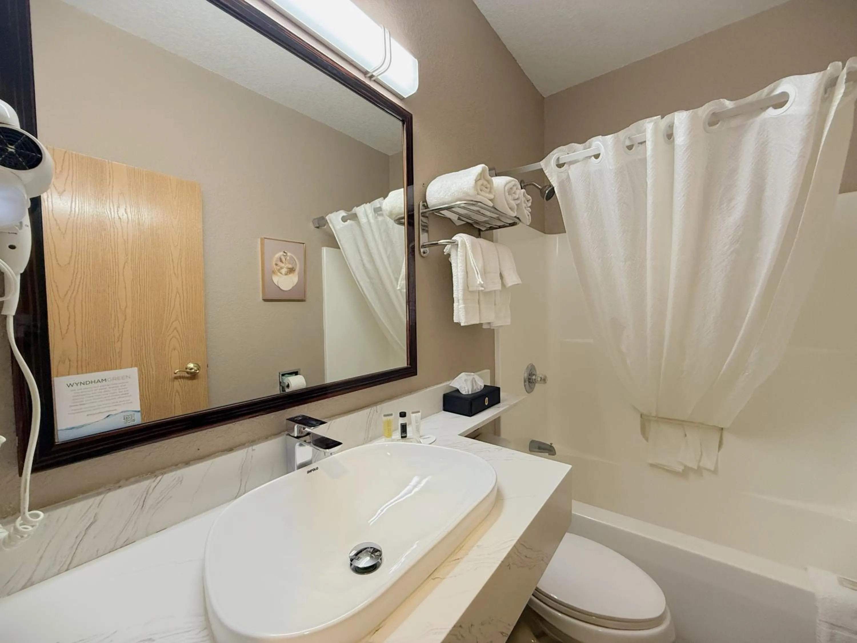 Bathroom in Super 8 by Wyndham Uniontown PA