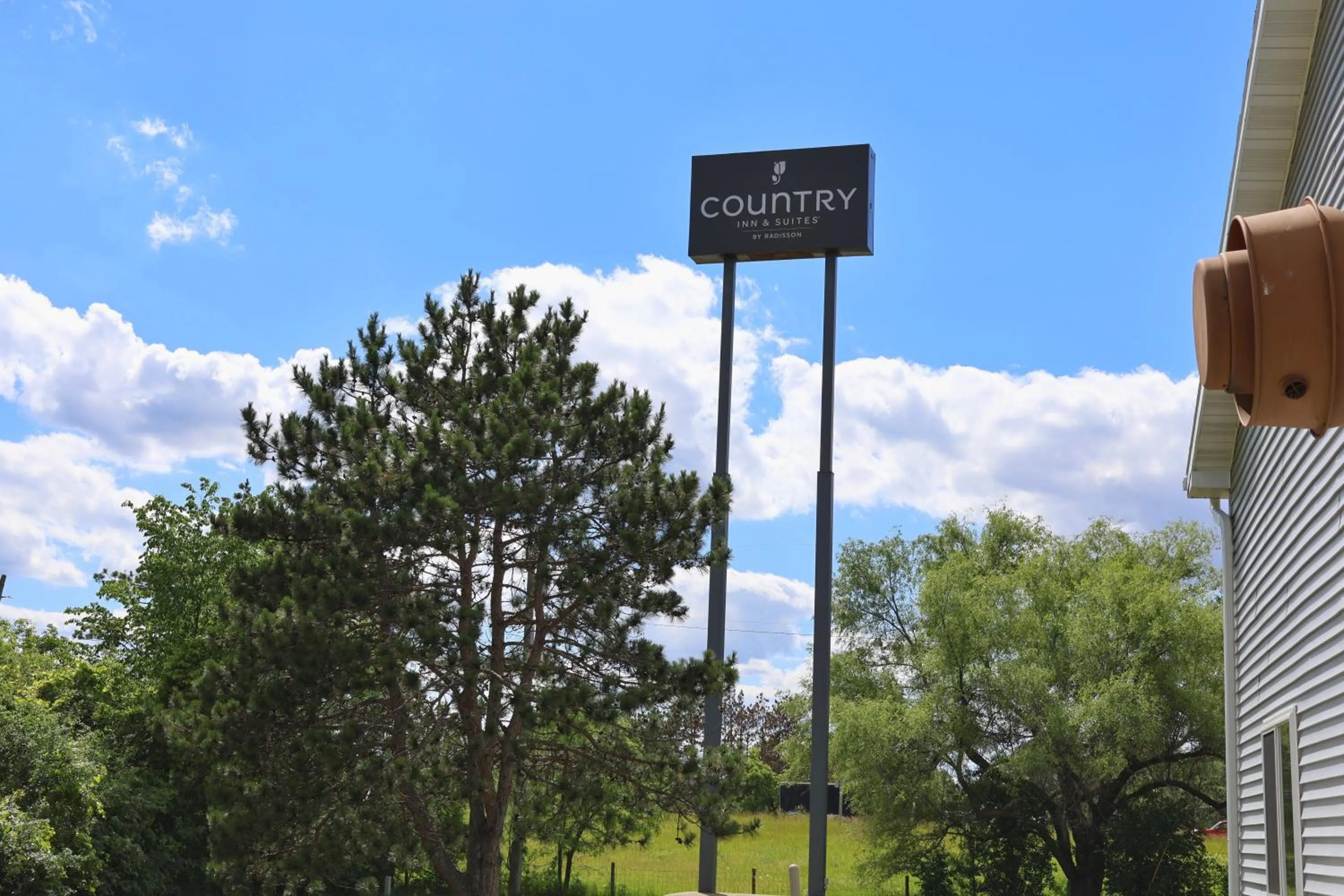 Property building in Country Inn & Suites by Radisson, Sparta, WI