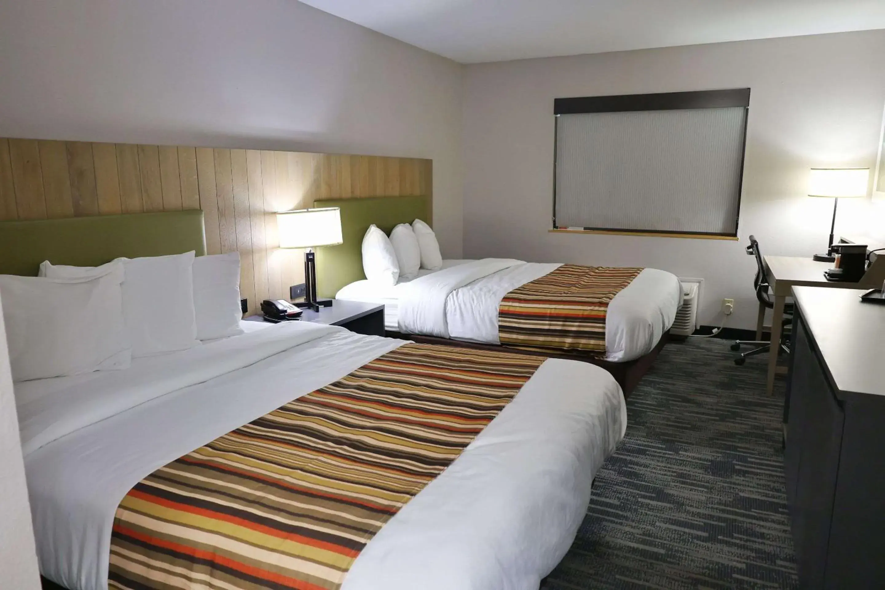 Bedroom, Bed in Country Inn & Suites by Radisson, Sparta, WI Bedroom, Bed in Country Inn & Suites by Radisson, Sparta, WI