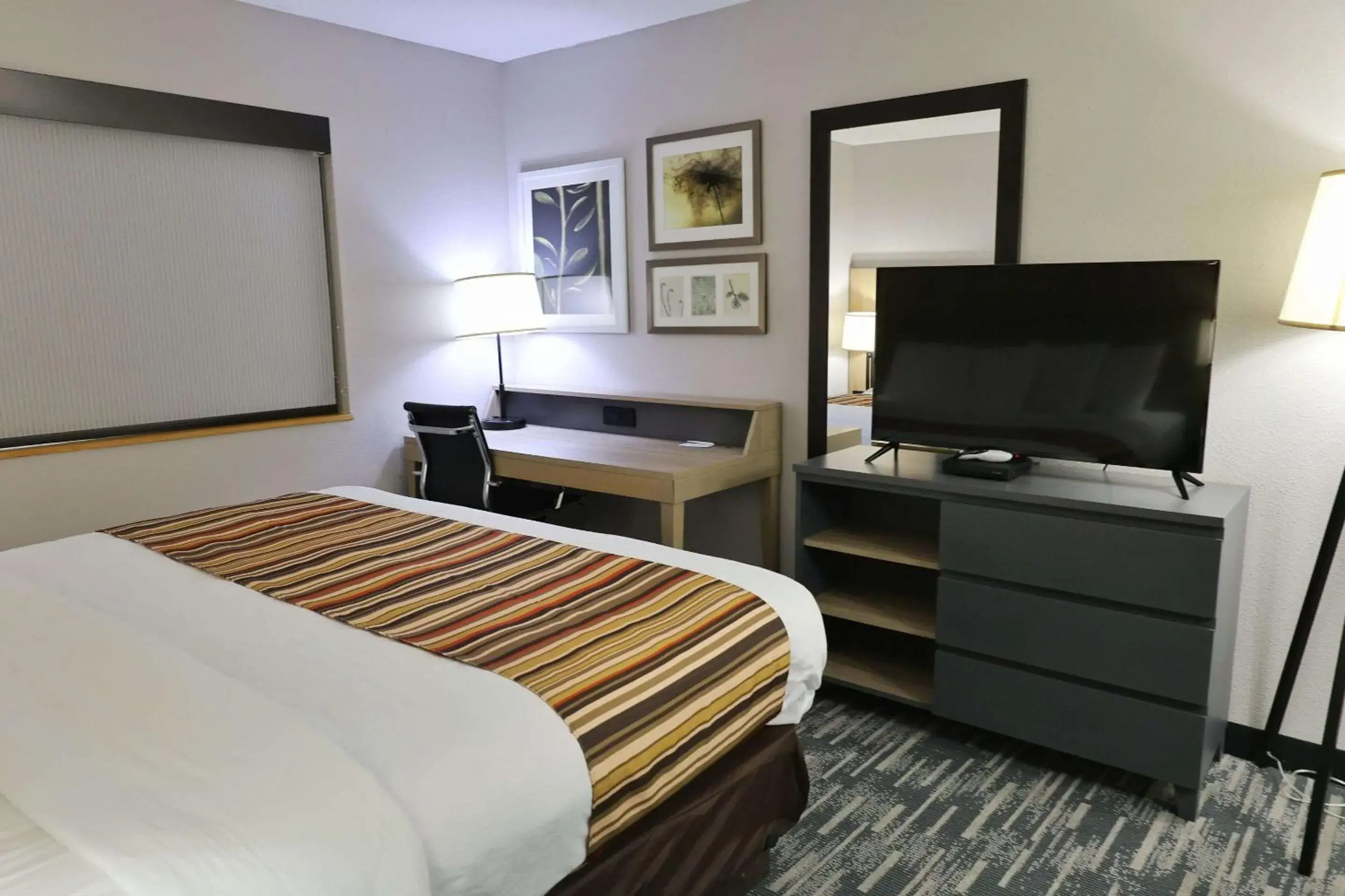 Bedroom, Bed in Country Inn & Suites by Radisson, Sparta, WI Bedroom, Bed in Country Inn & Suites by Radisson, Sparta, WI