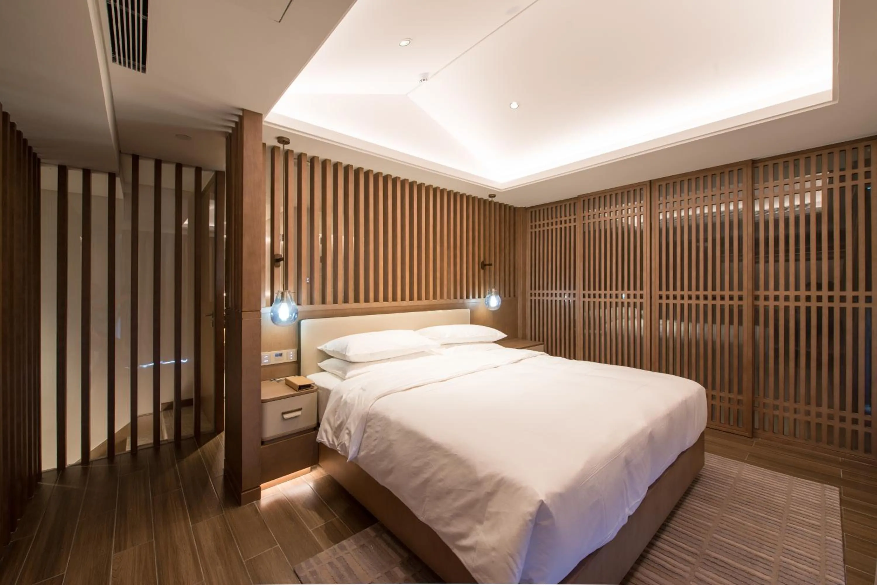 Bed in Wingate by Wyndham Hainan Chengmai