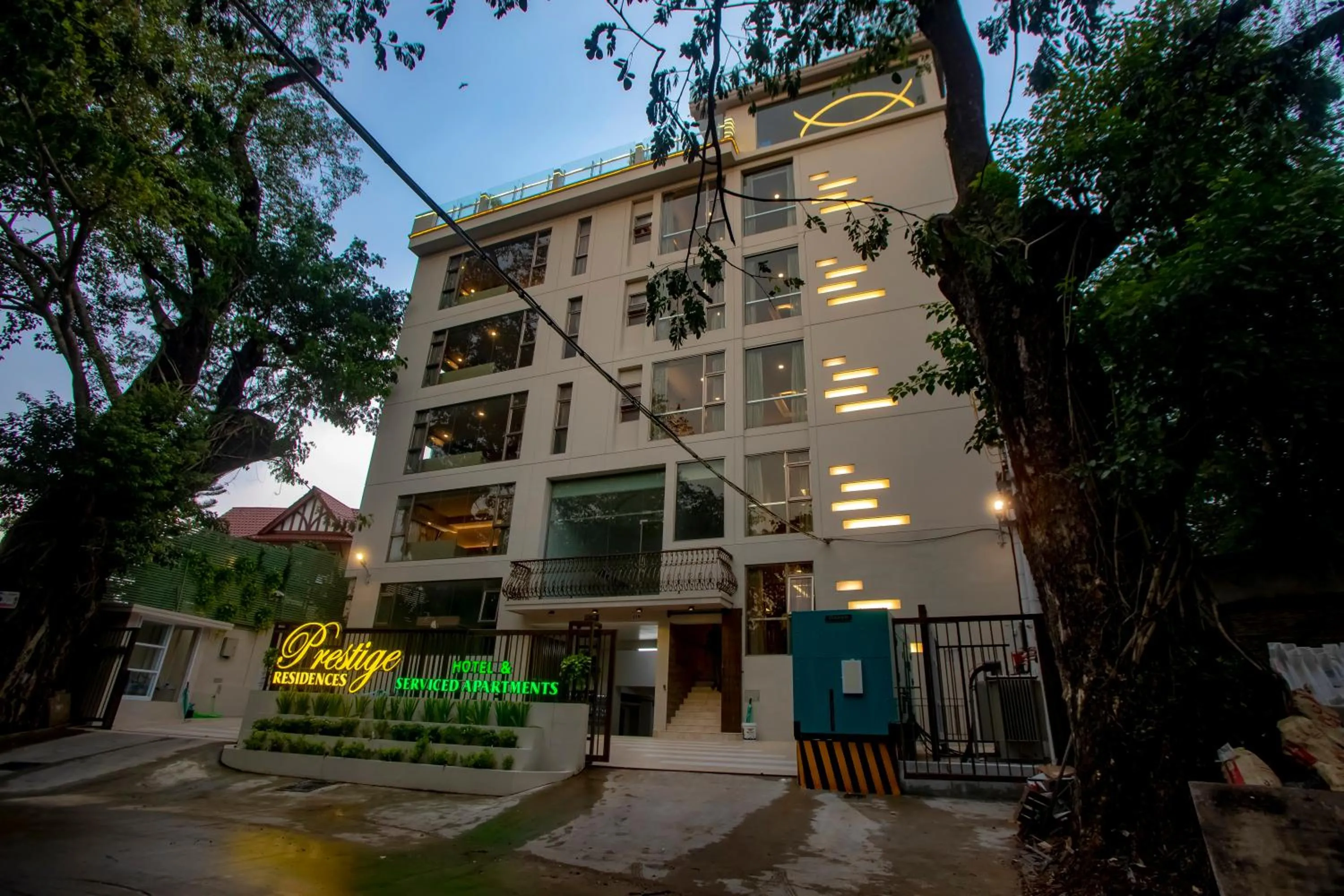 Property building in Prestige Residences at Golden Valley by Grand United Hospitality