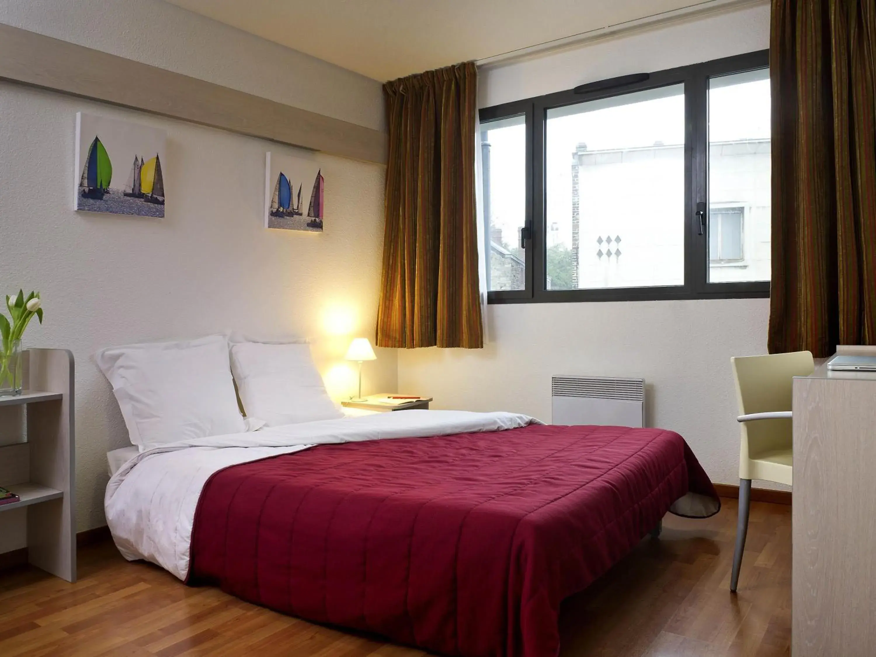 Bedroom, Bed in Aparthotel Adagio Access Rennes Centre Bedroom, Bed in Aparthotel Adagio Access Rennes Centre