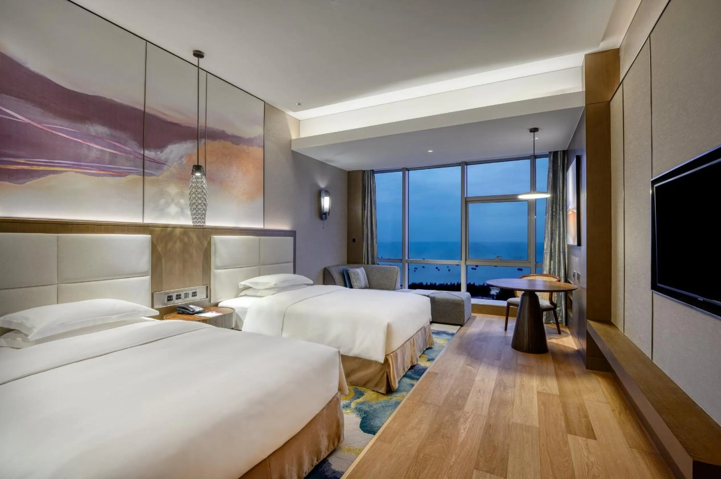 Photo of the whole room, Bed in Crowne Plaza Beihai Silver Beach by IHG