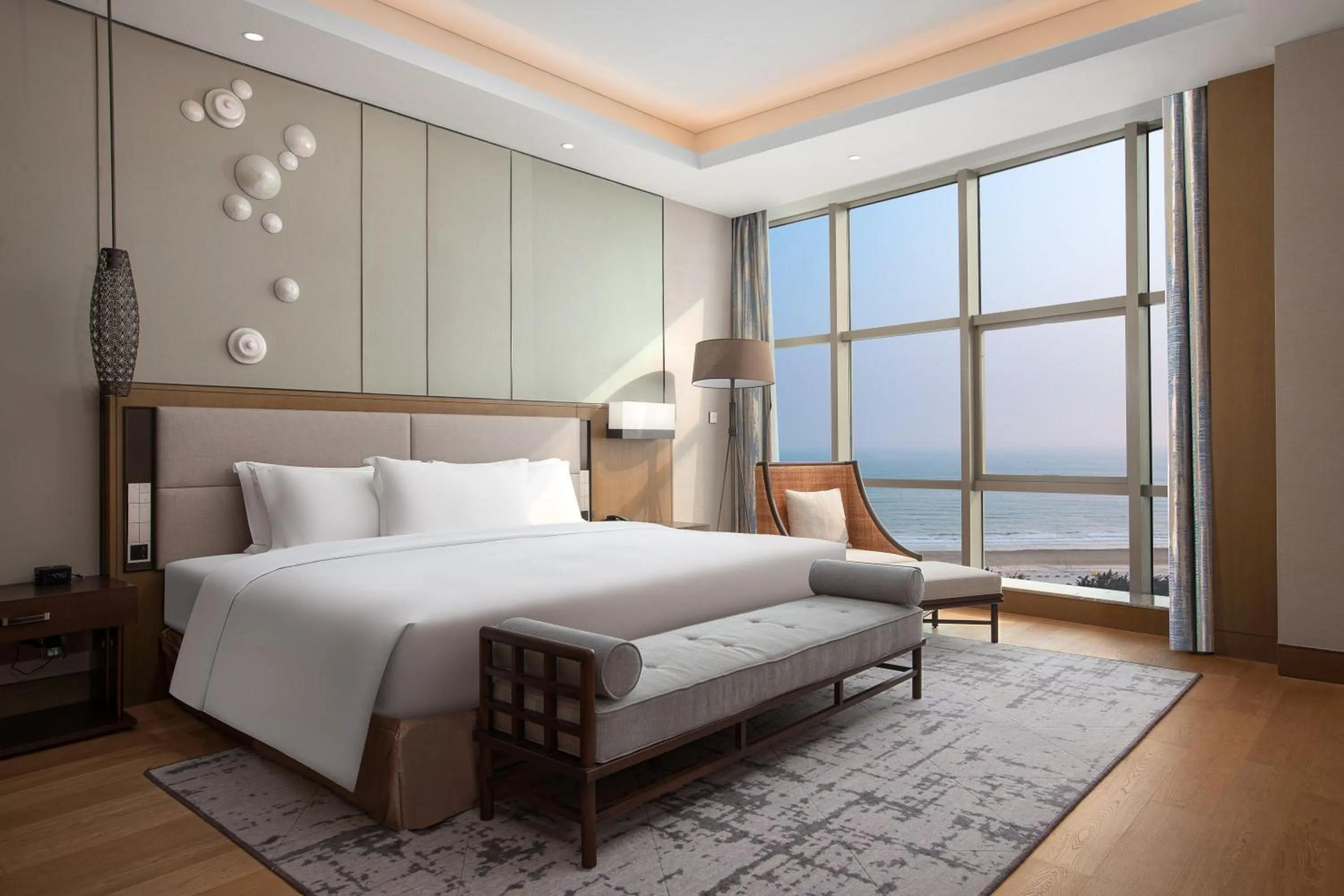 Photo of the whole room, Bed in Crowne Plaza Beihai Silver Beach by IHG