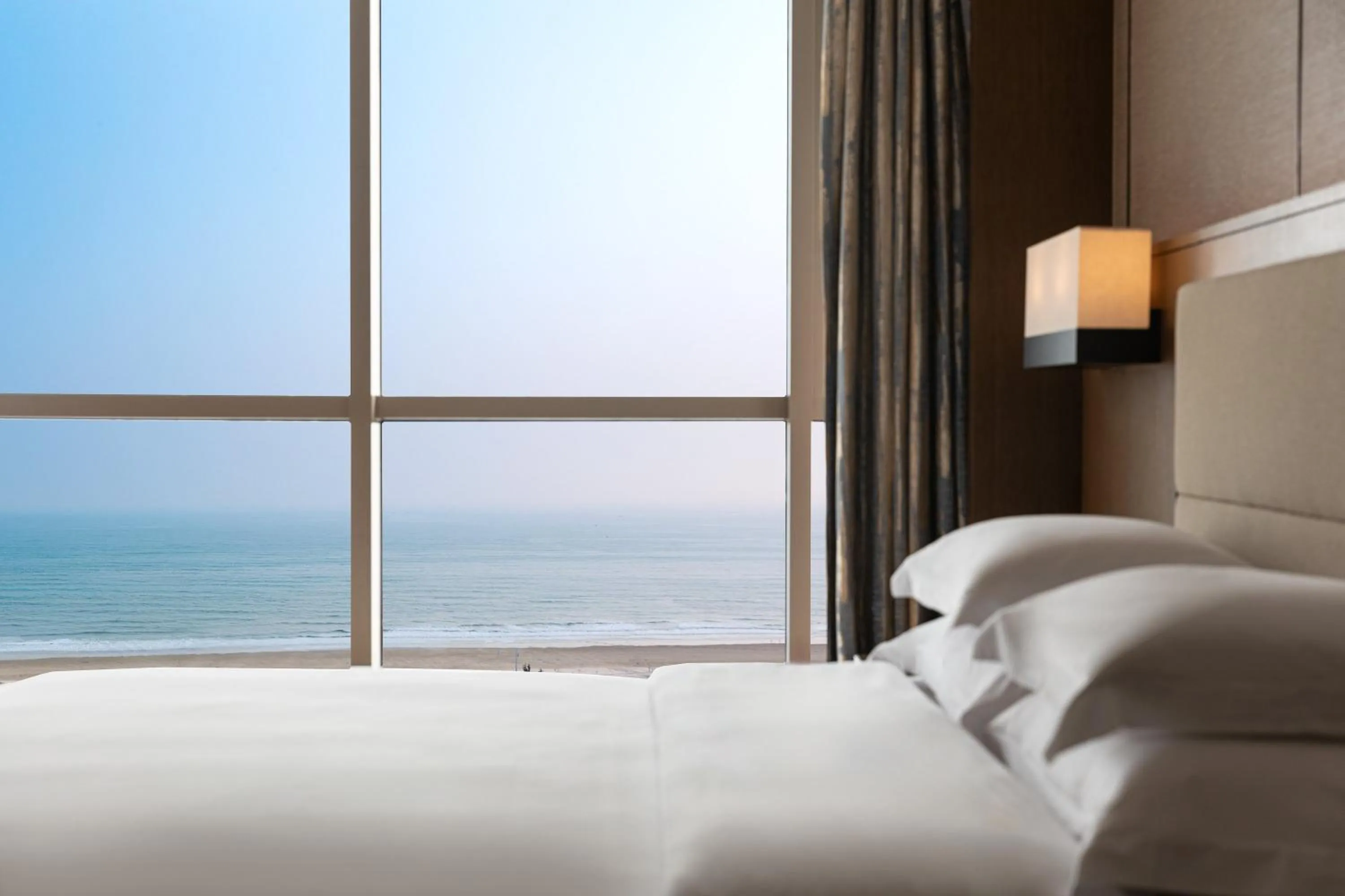 Photo of the whole room, Bed in Crowne Plaza Beihai Silver Beach by IHG