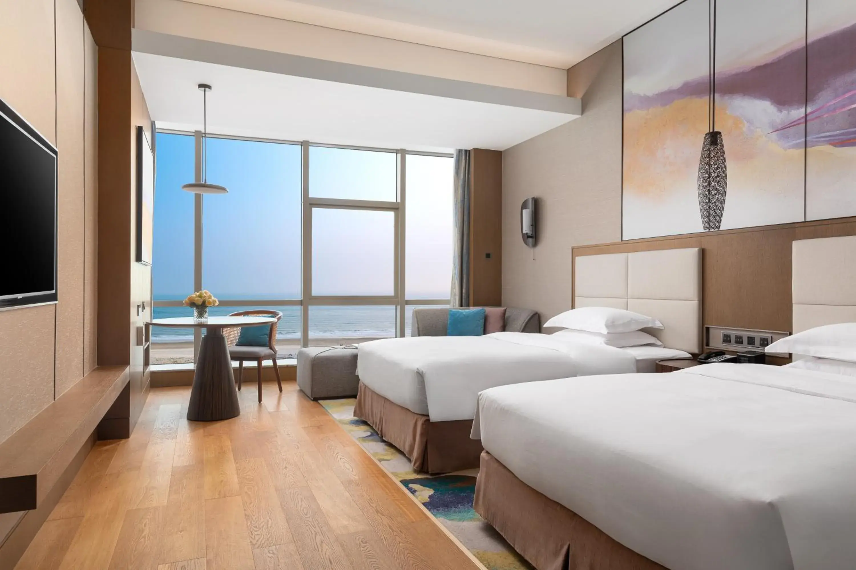 Photo of the whole room, Bed in Crowne Plaza Beihai Silver Beach by IHG Photo of the whole room, Bed in Crowne Plaza Beihai Silver Beach by IHG