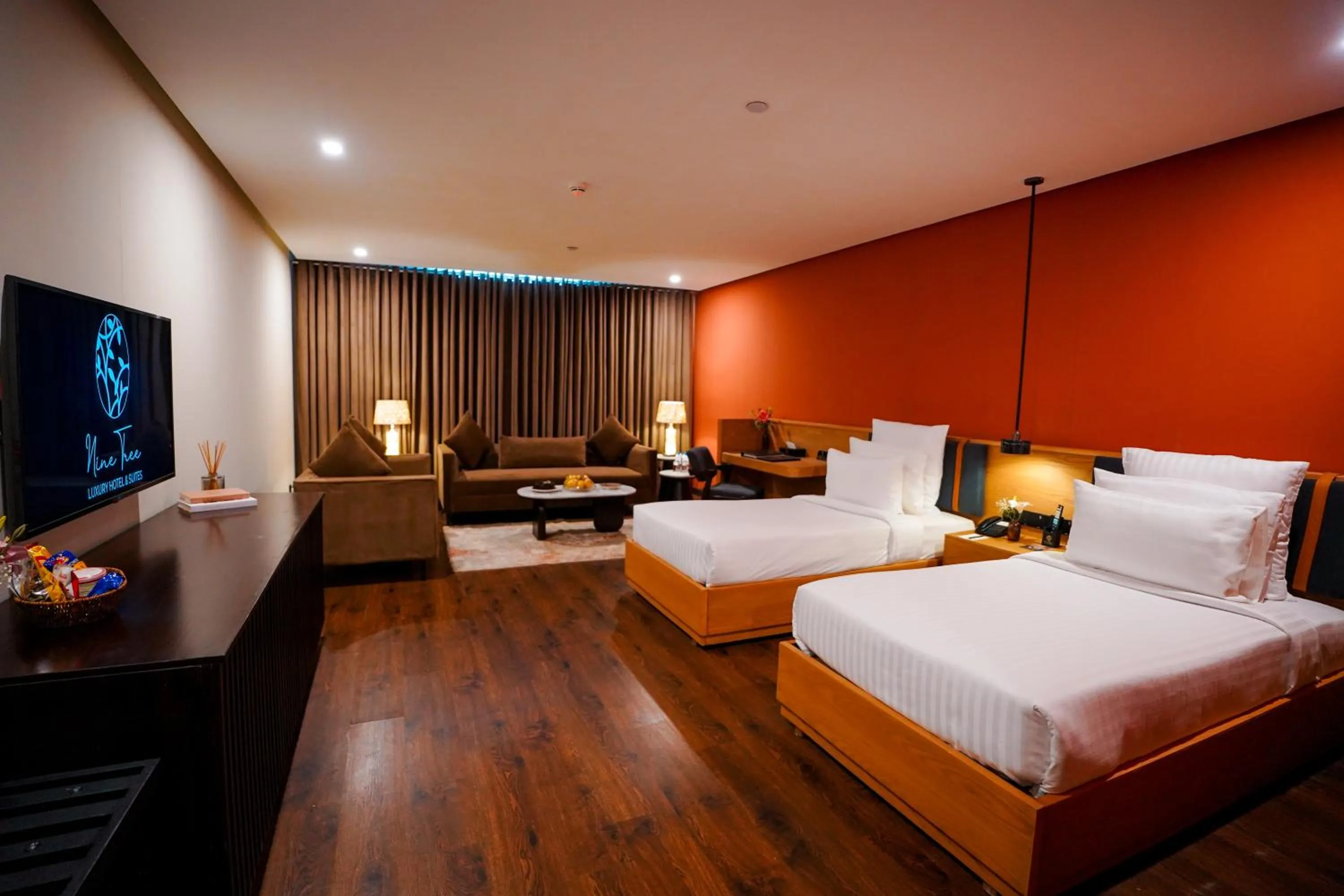 Photo of the whole room, Bed in Nine Tree Luxury Hotel & Suites Lahore