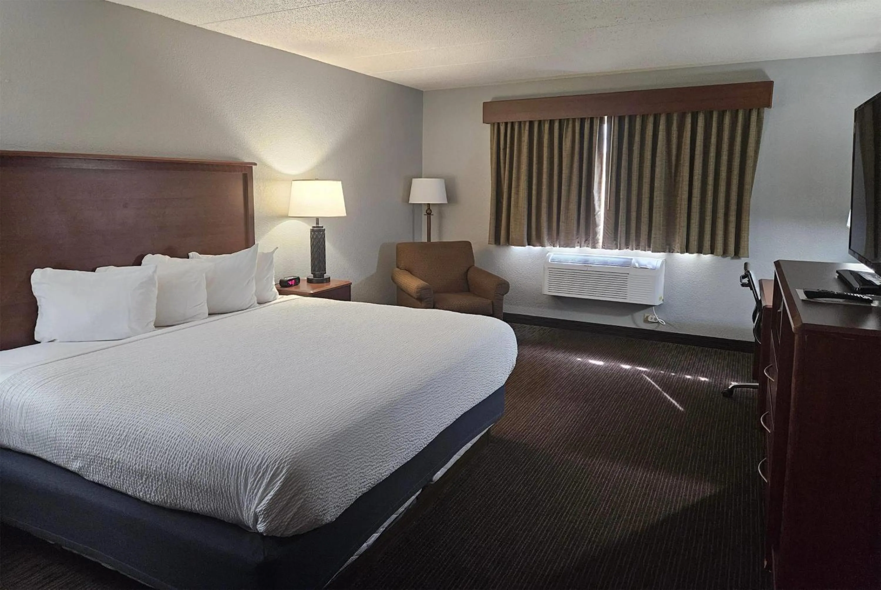 Photo of the whole room, Bed in AmericInn by Wyndham Marshall