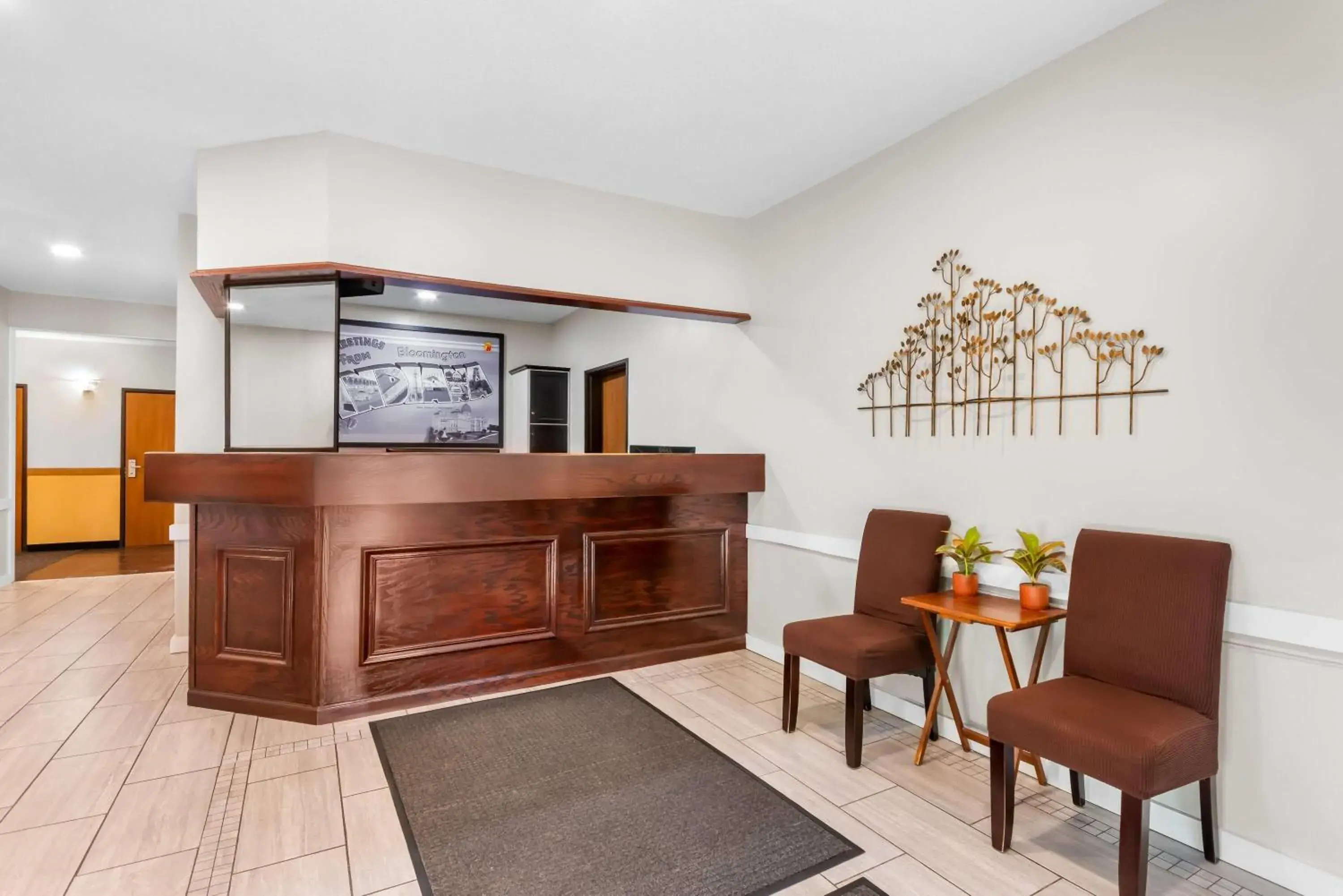 Lobby or reception in Super 8 by Wyndham Bloomington University Area Lobby or reception in Super 8 by Wyndham Bloomington University Area