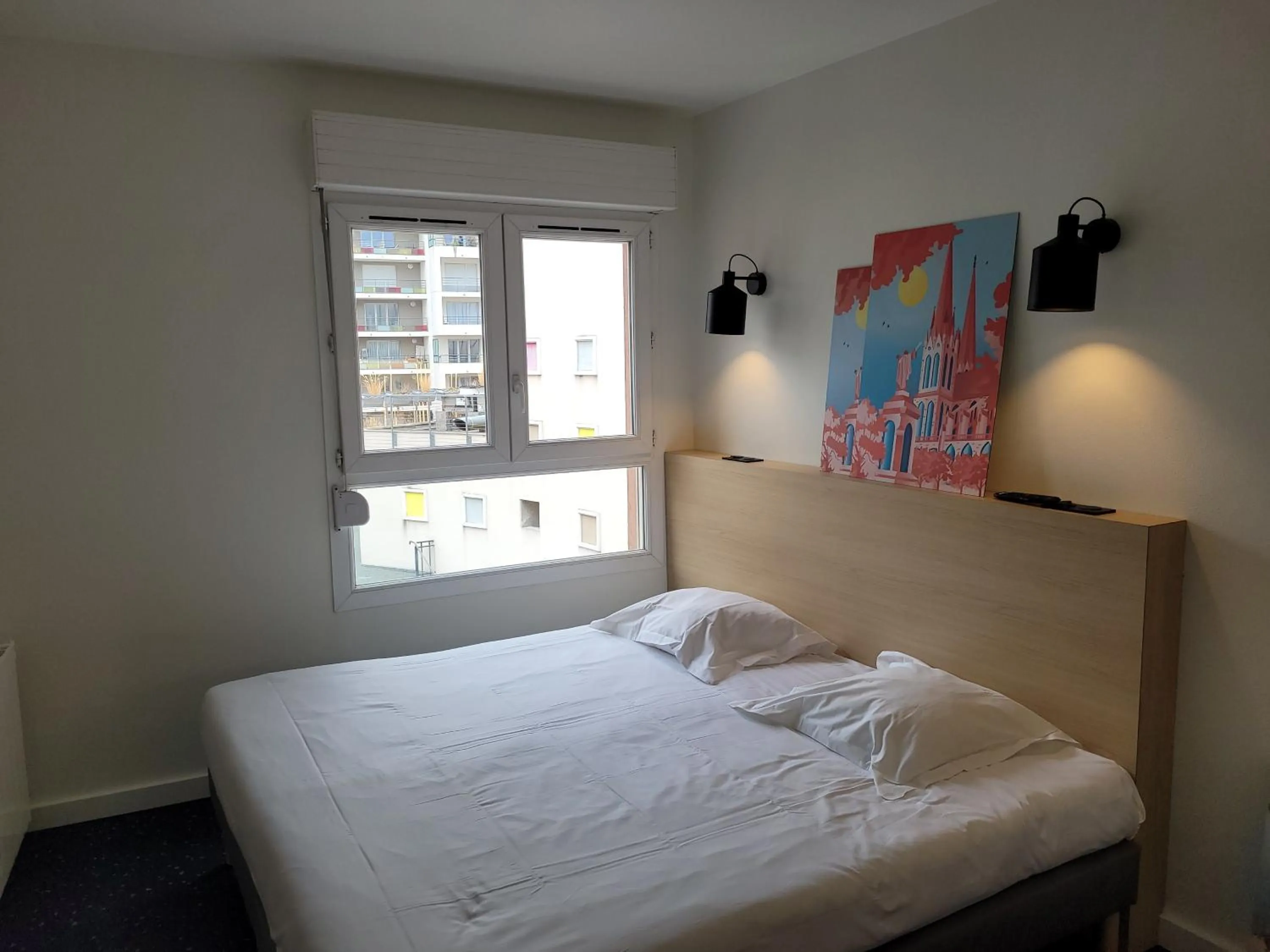 Bed in Hôtel et Résidence Les Lauréades Clermont-Ferrand Centre Jaude