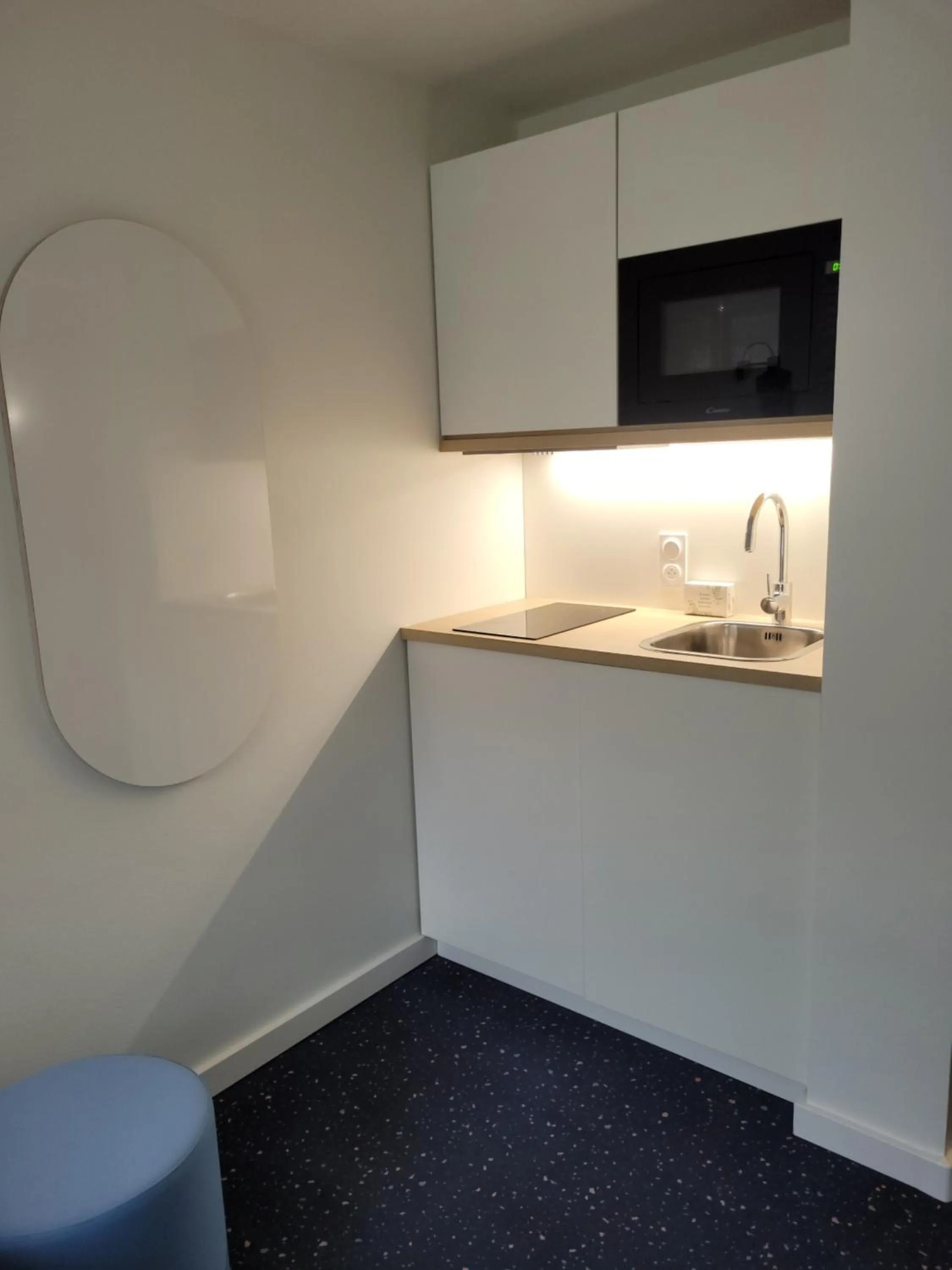 Kitchen or kitchenette in Hôtel et Résidence Les Lauréades Clermont-Ferrand Centre Jaude