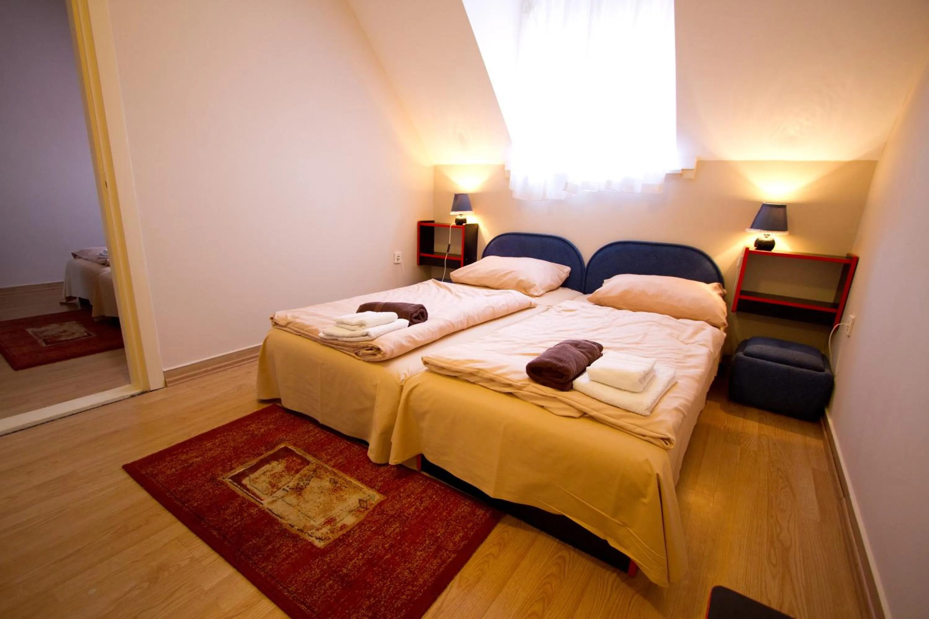 Bed in Piknik Wellness Hotel