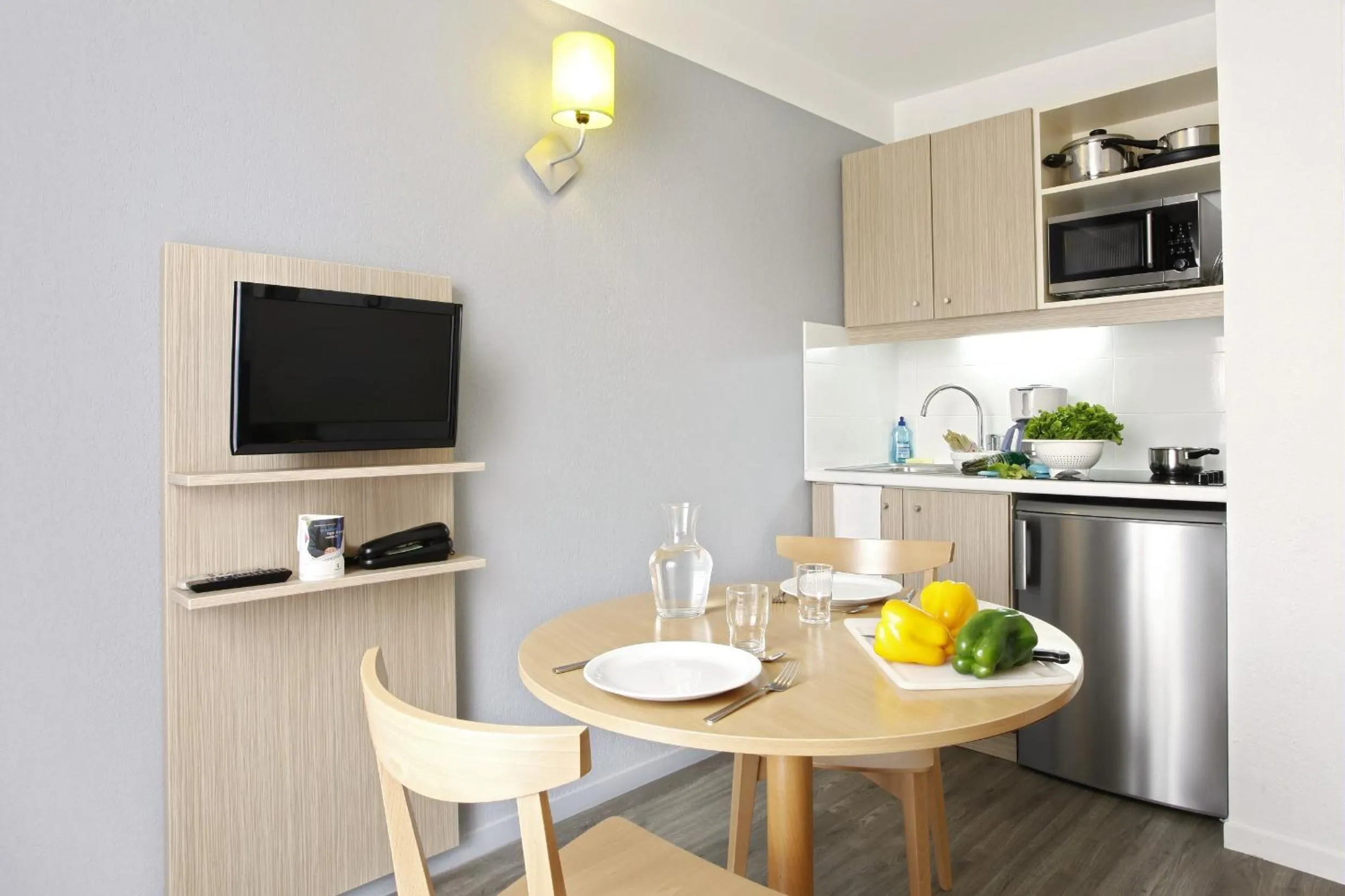 Kitchen or kitchenette in Aparthotel Adagio Access Marseille Prado Périer