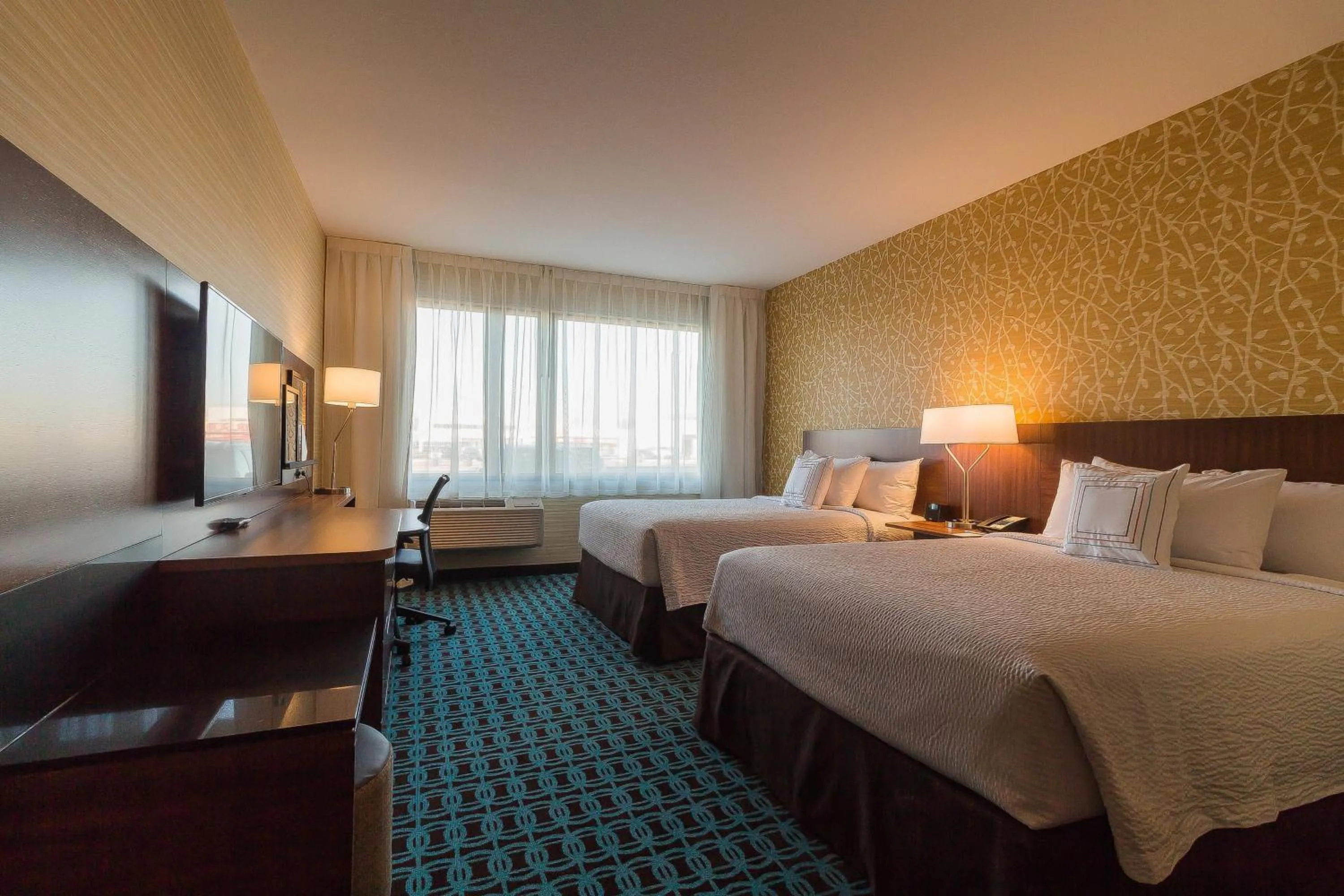 Photo of the whole room, Bed in Fairfield by Marriott Regina