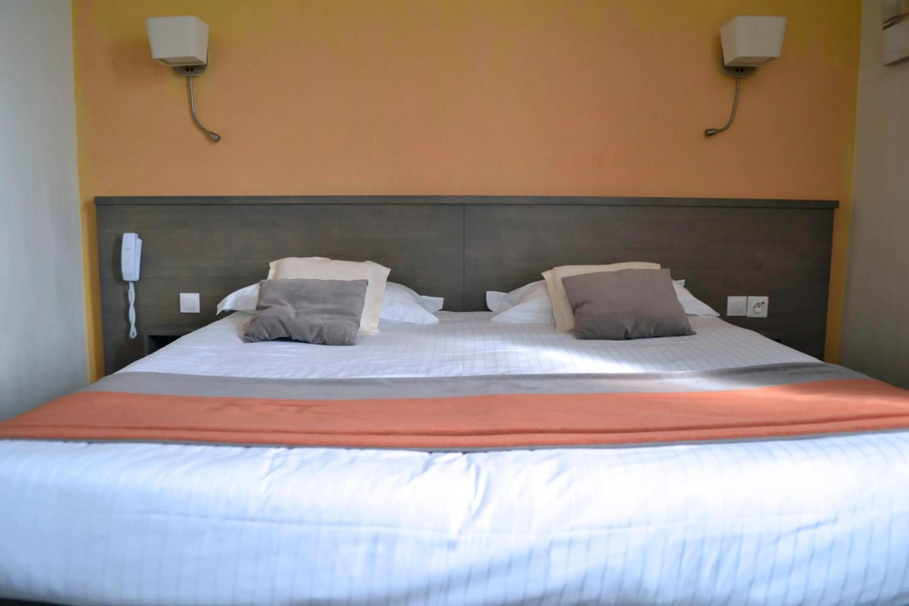 Bed in Brit Hotel Le Surcouf