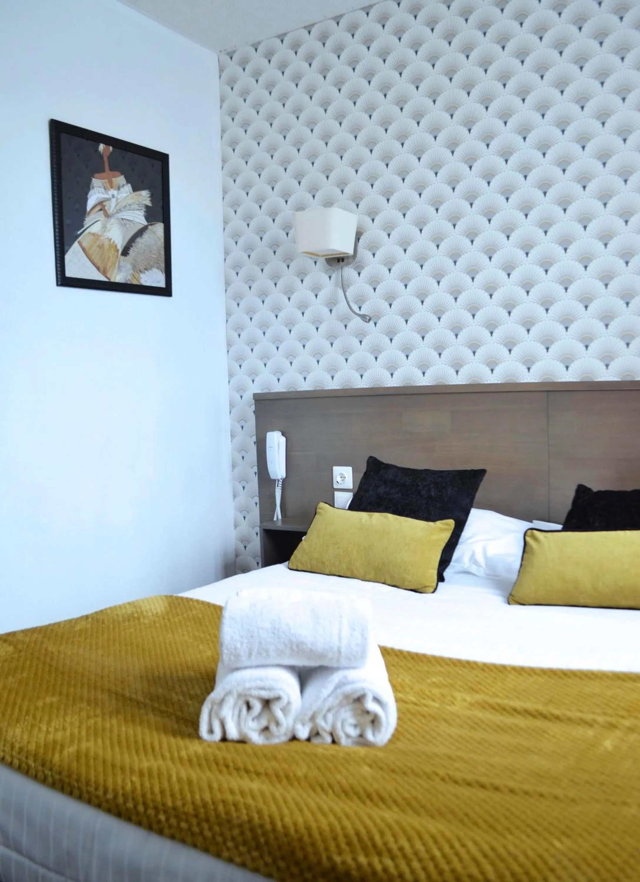 Bed in Brit Hotel Le Surcouf