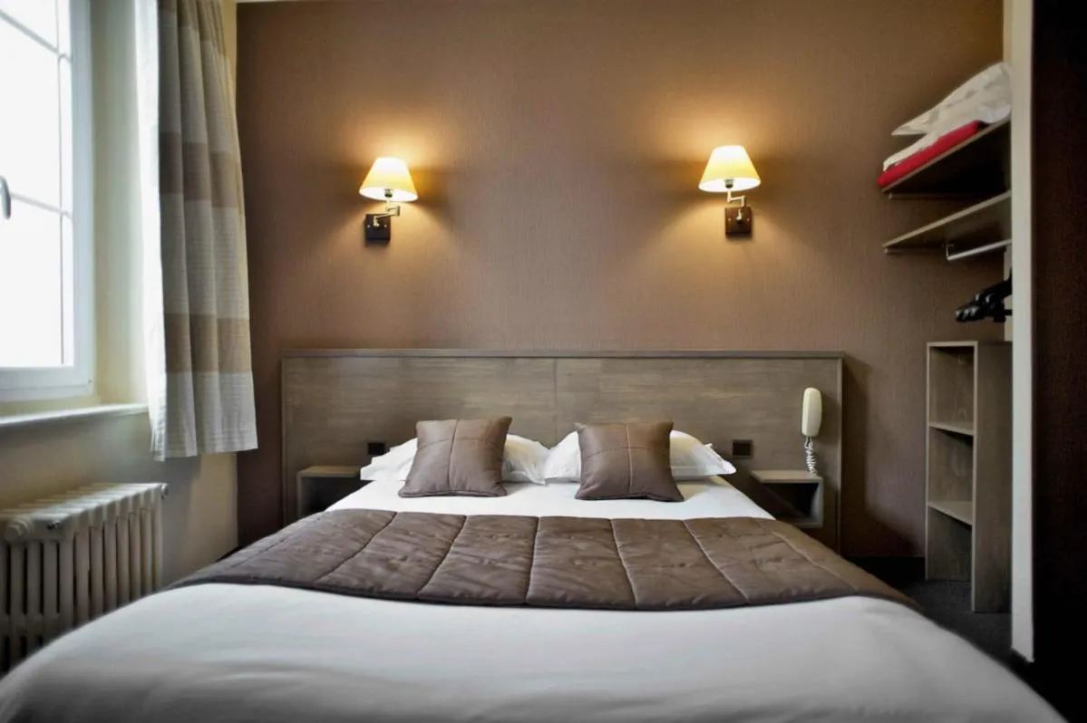 Bed in Brit Hotel Le Surcouf
