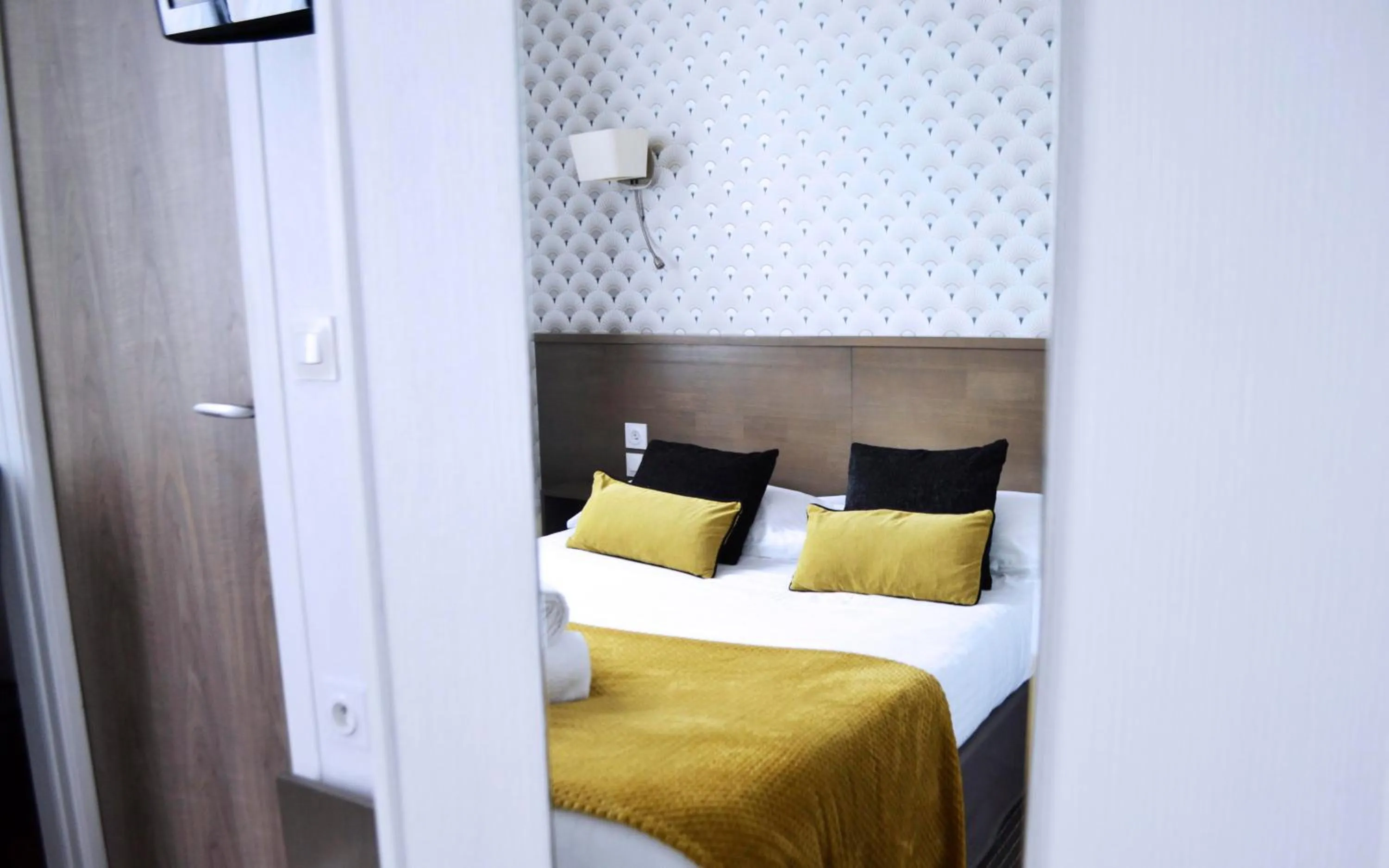 Bed in Brit Hotel Le Surcouf