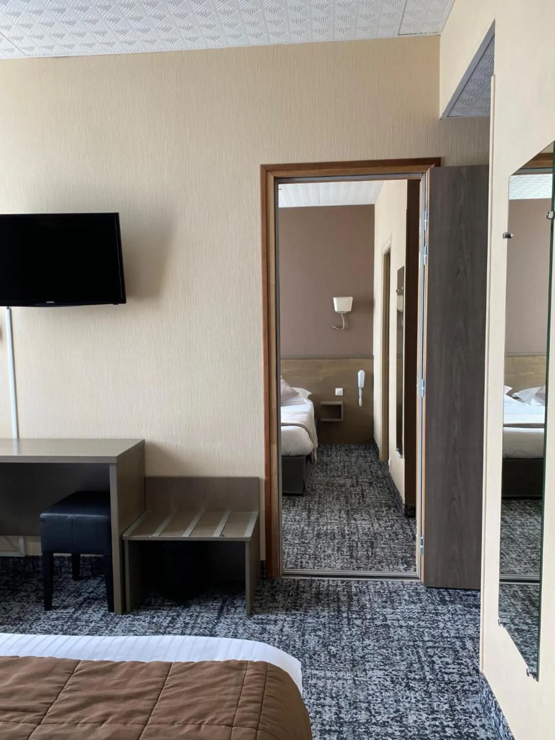 Bed in Brit Hotel Le Surcouf