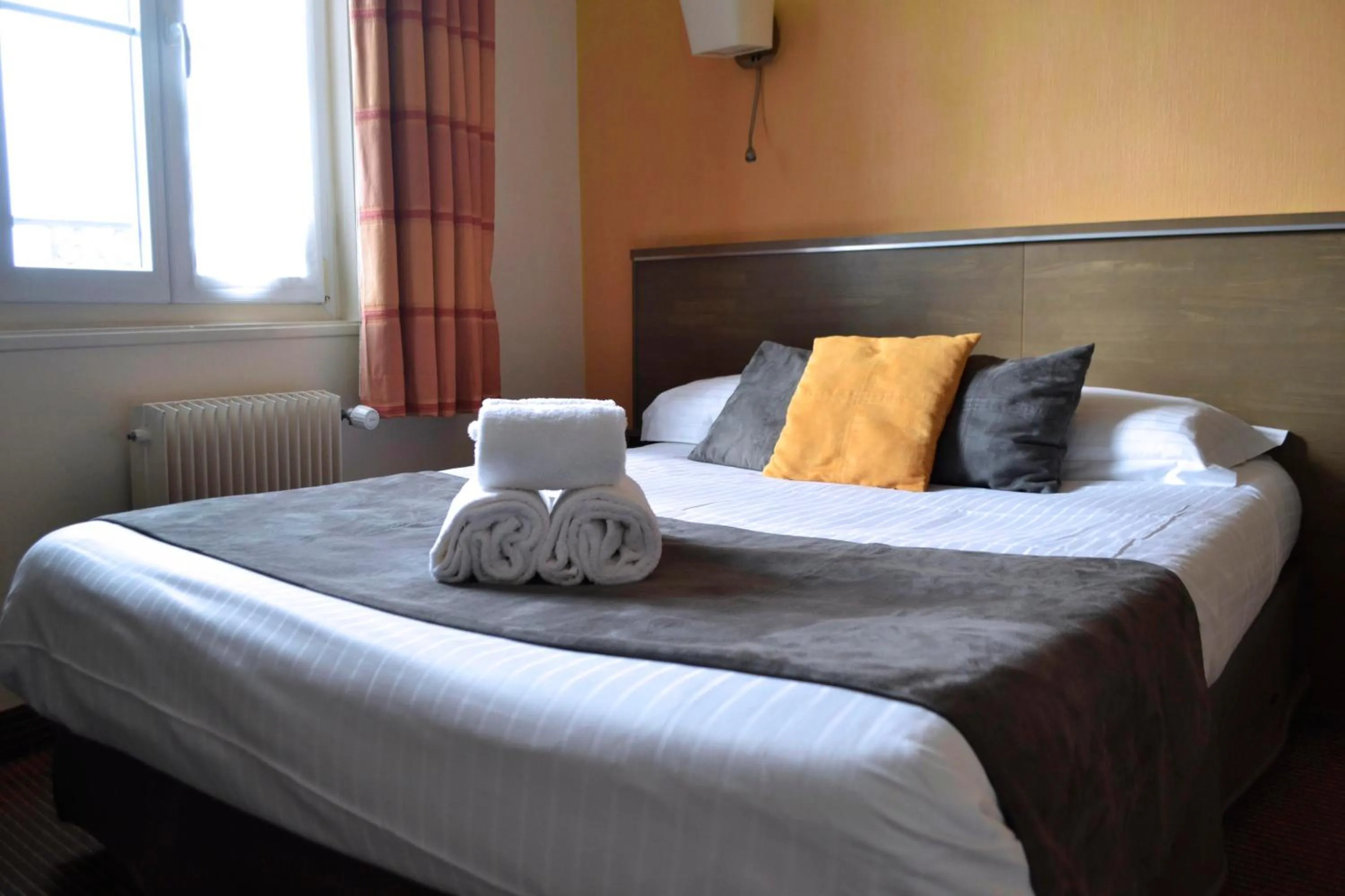 Bed in Brit Hotel Le Surcouf