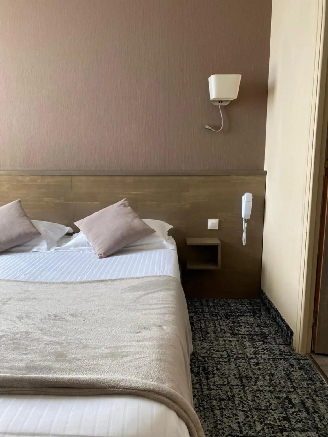 Bed in Brit Hotel Le Surcouf