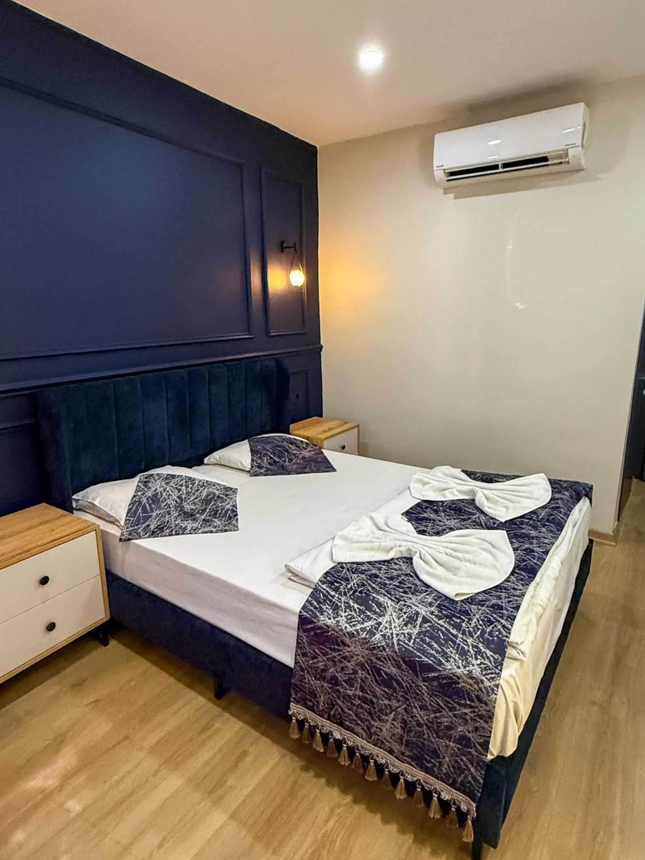 Bed in The Reina Hotel Bed in The Reina Hotel