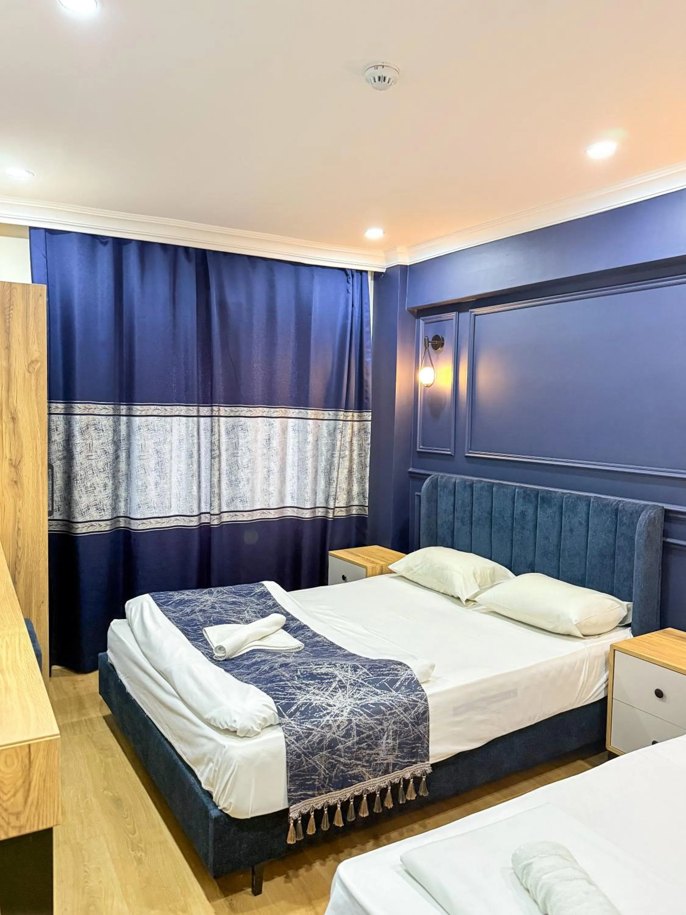 Bed in The Reina Hotel