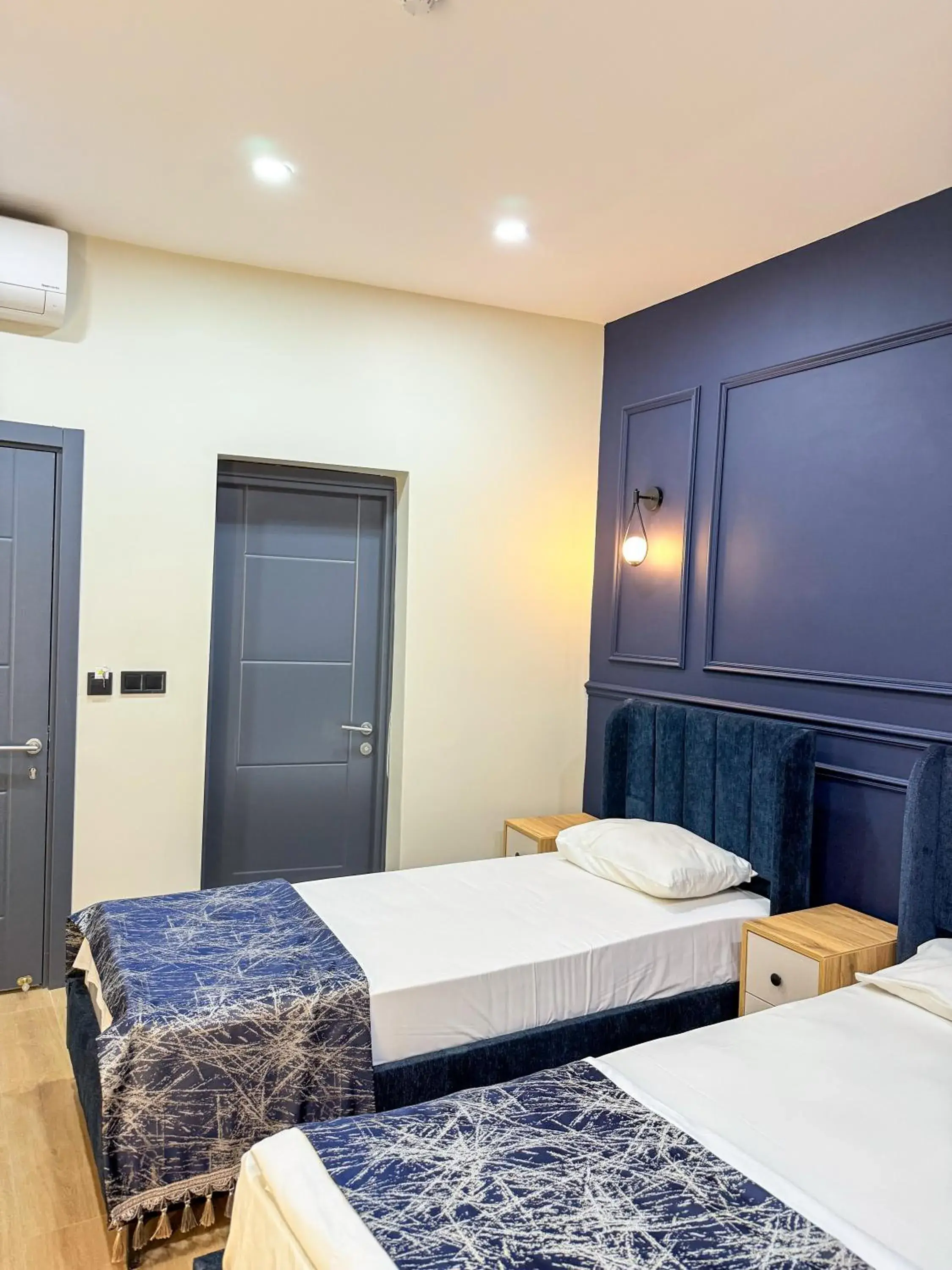 Bed in The Reina Hotel Bed in The Reina Hotel