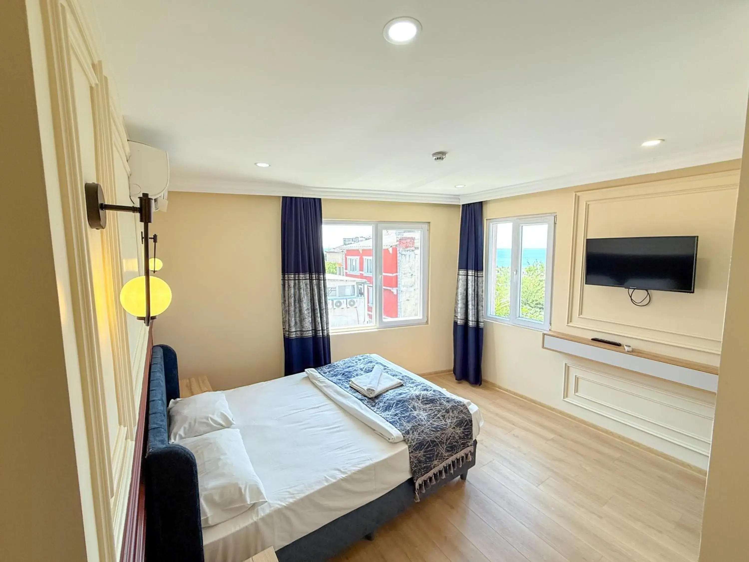 Bed in The Reina Hotel Bed in The Reina Hotel