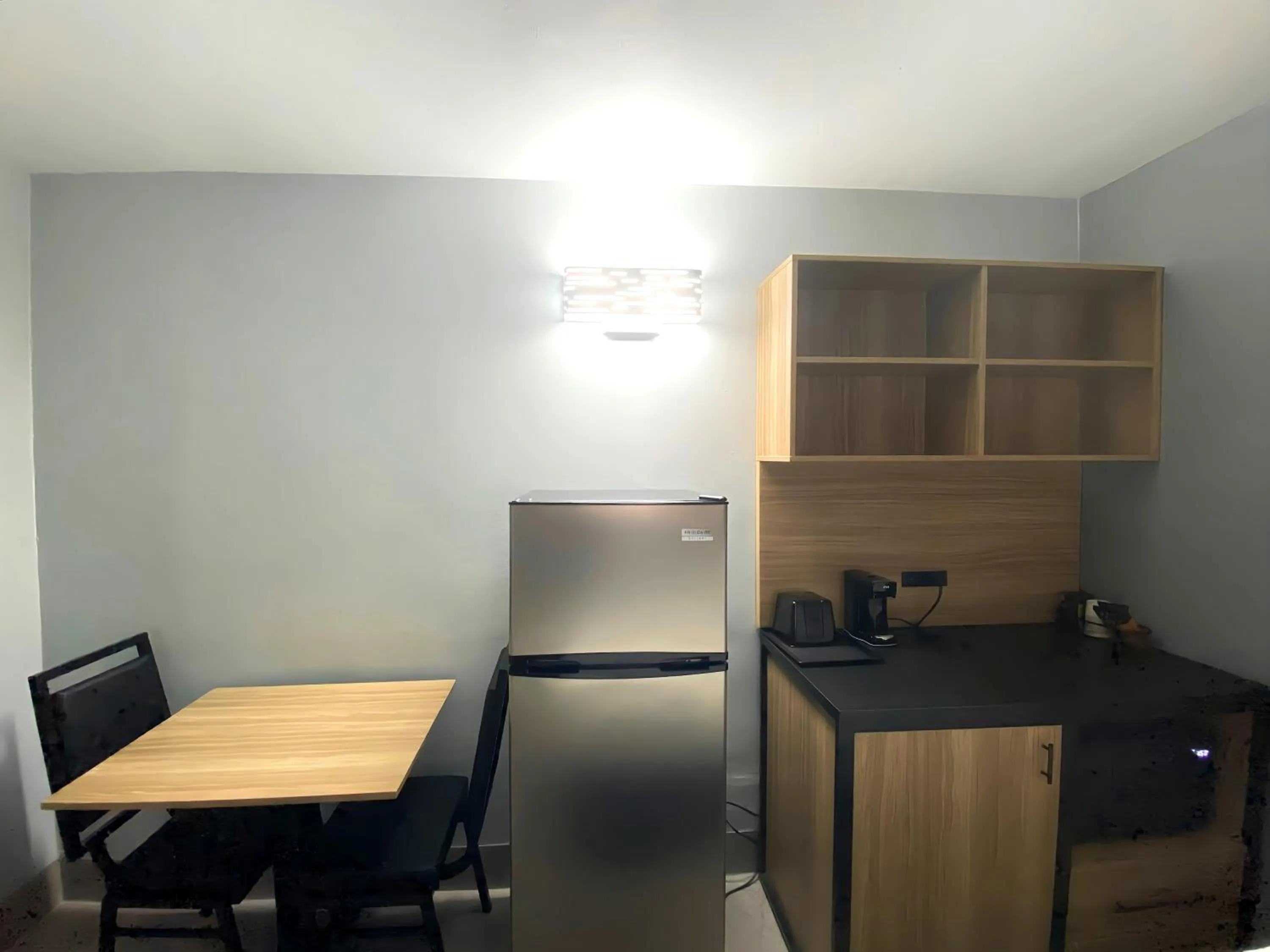 kitchen in Days Inn & Suites by Wyndham Texas City