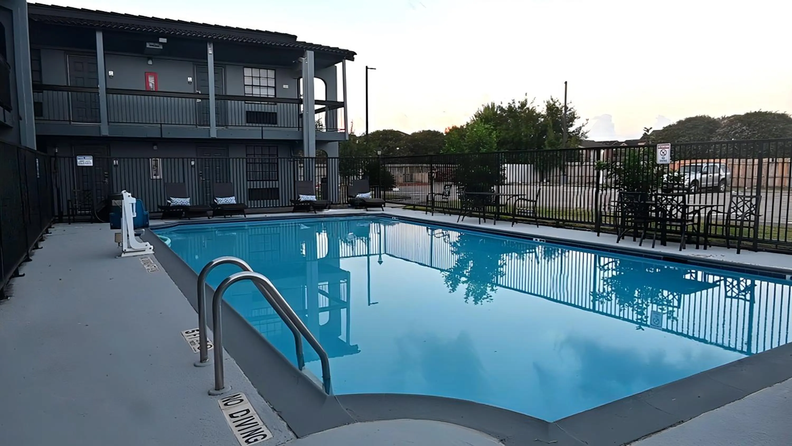Swimming pool in Days Inn & Suites by Wyndham Texas City