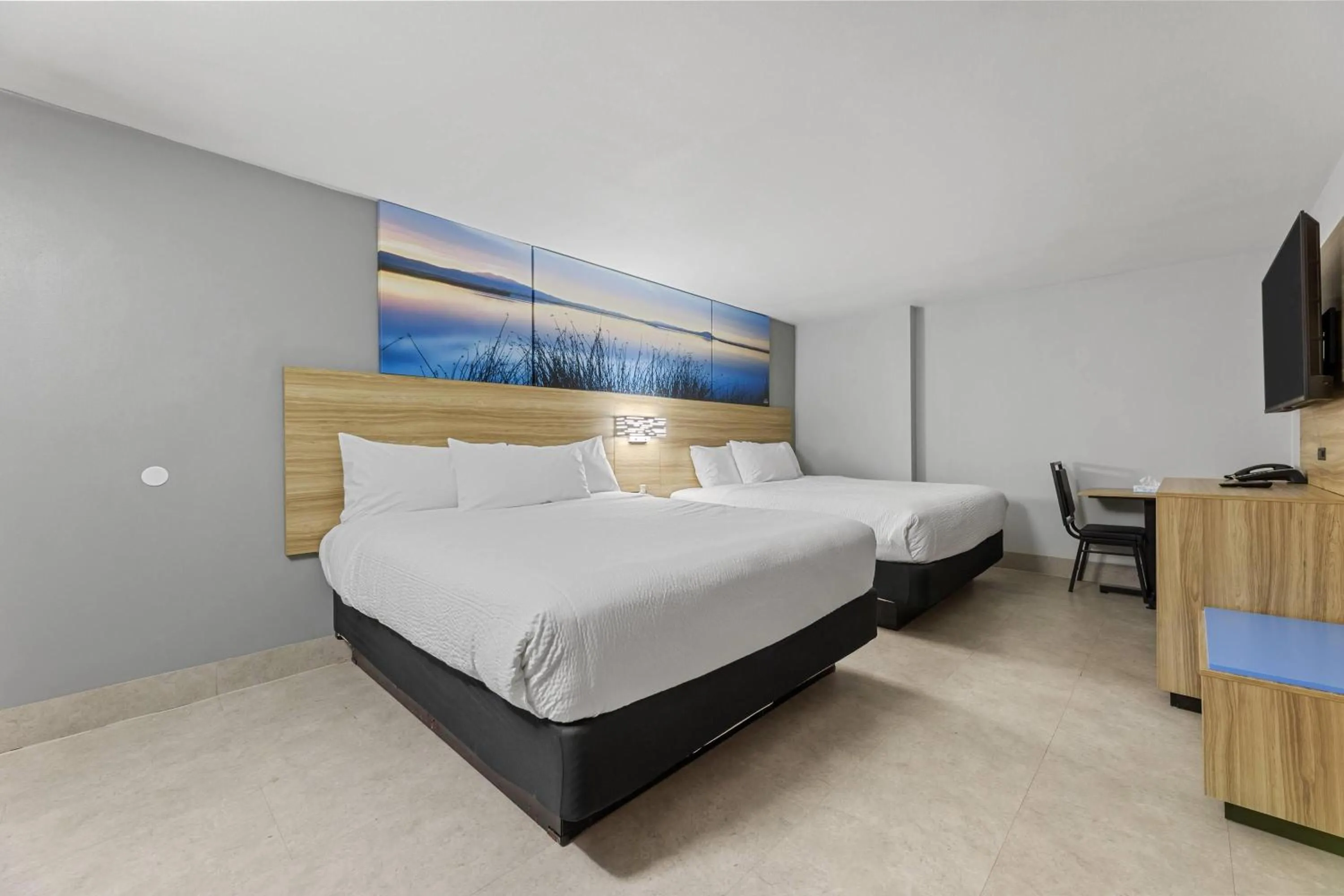 Photo of the whole room, Bed in Days Inn & Suites by Wyndham Texas City