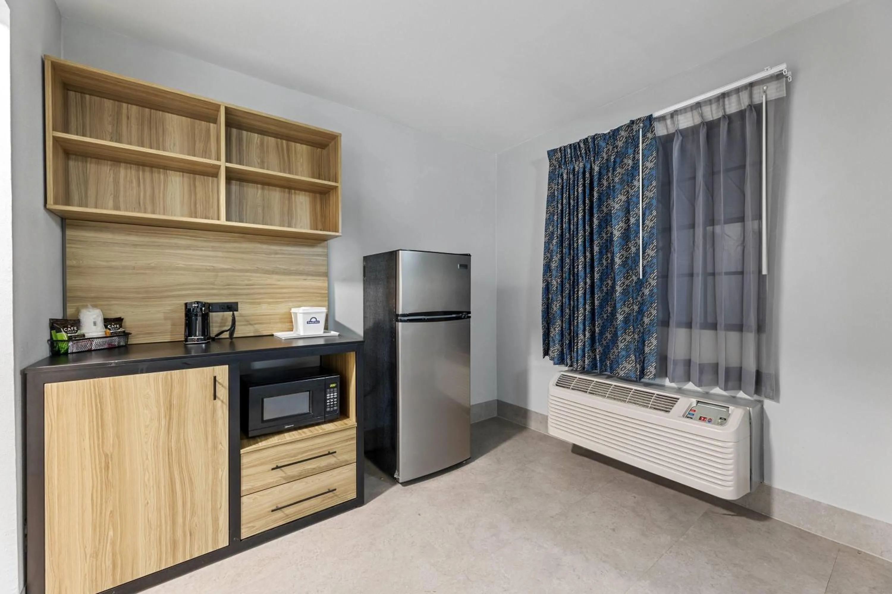 Photo of the whole room in Days Inn & Suites by Wyndham Texas City