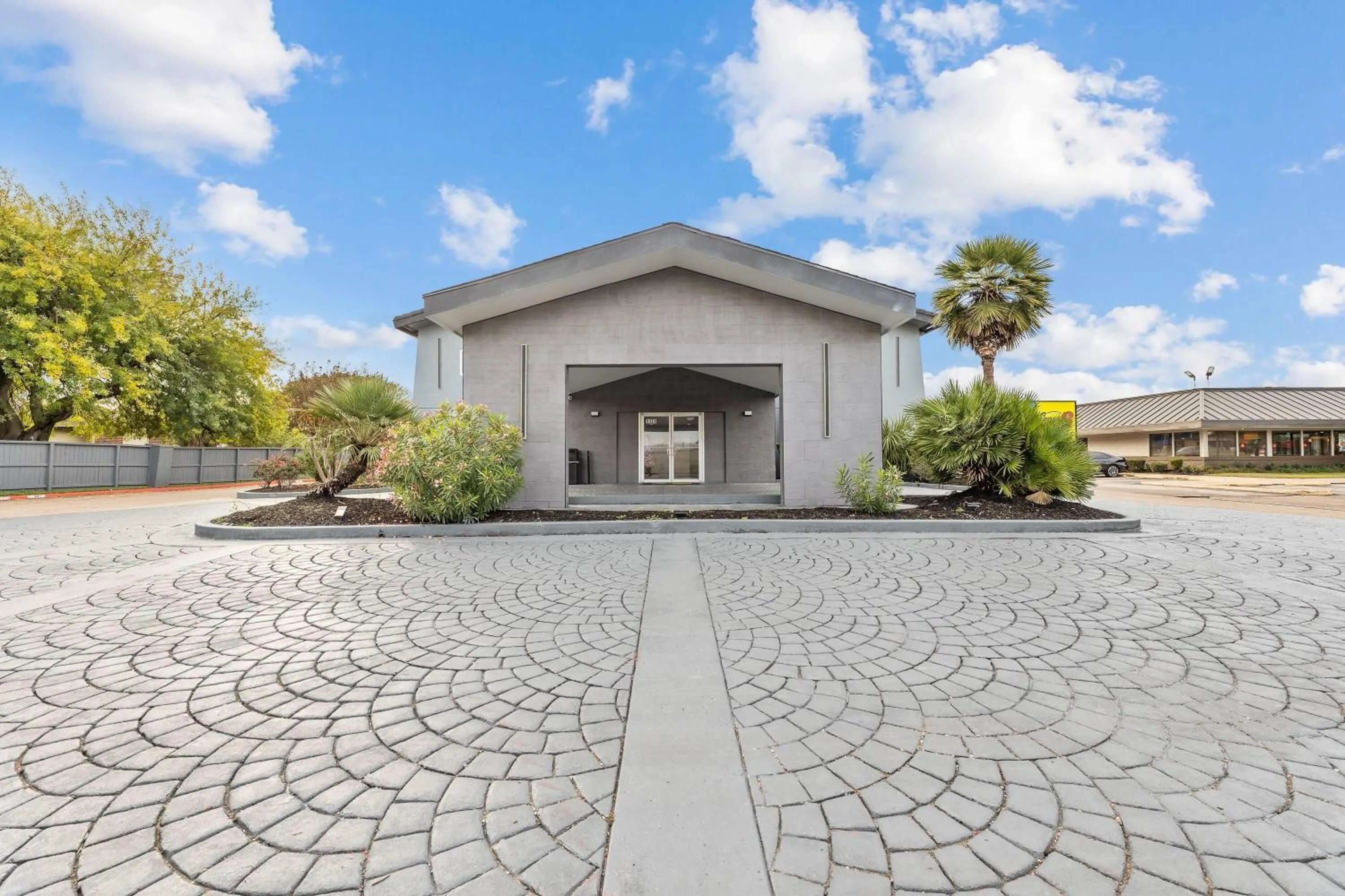 Property building in Days Inn & Suites by Wyndham Texas City