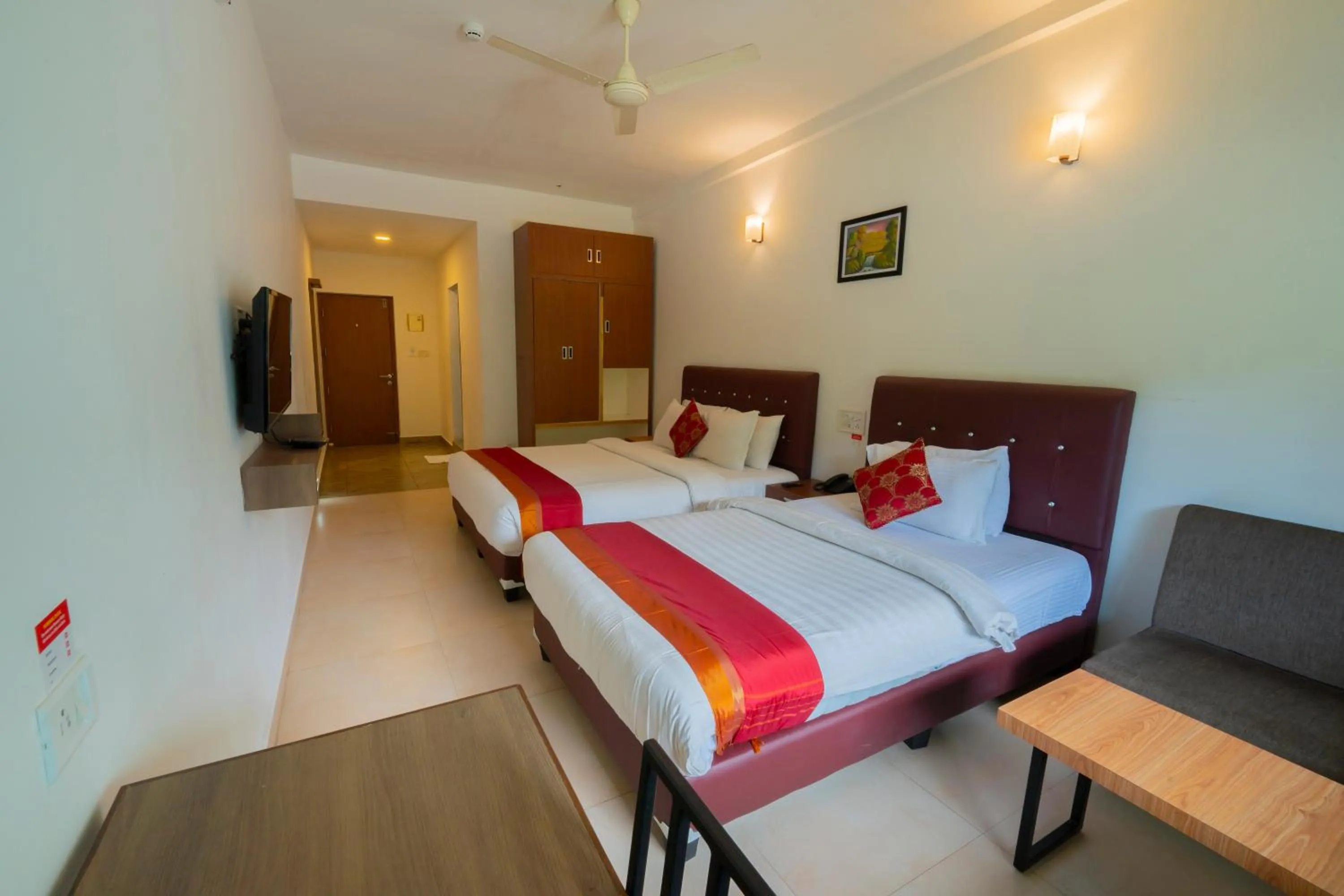 Bed in The Sanihara Hotel & Resort