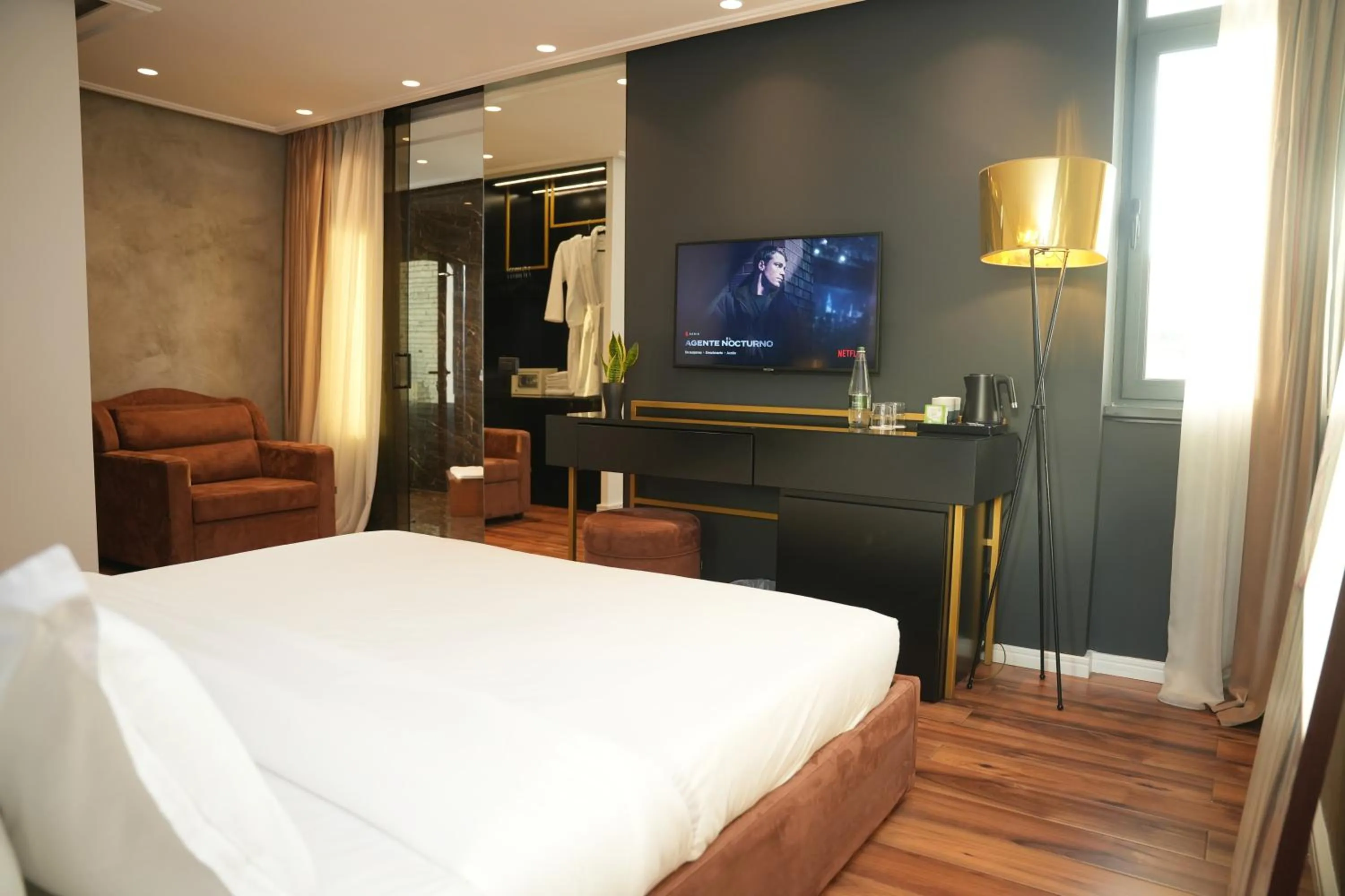 Bed in La Suite Boutique Hotel