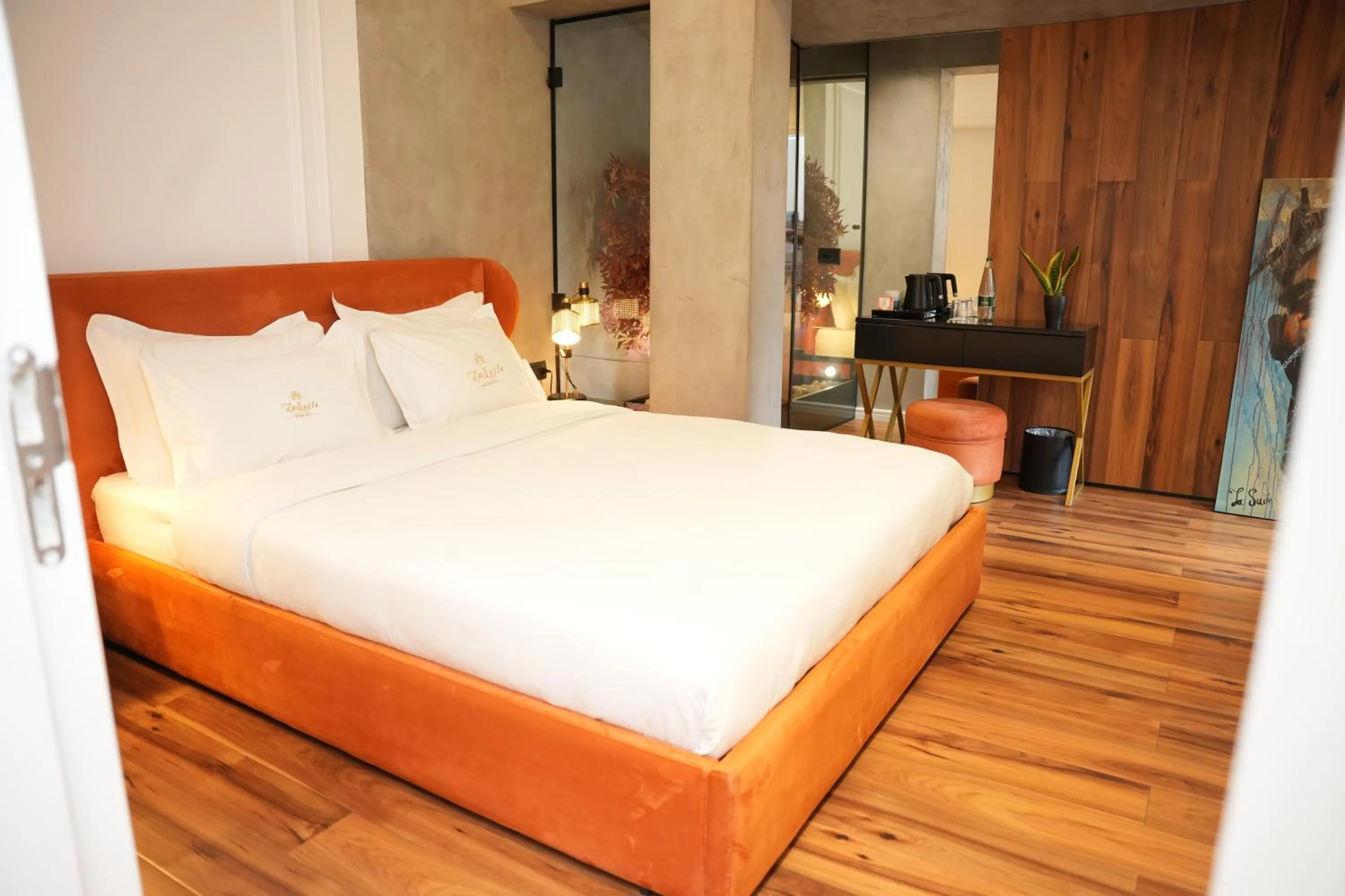 Bed in La Suite Boutique Hotel