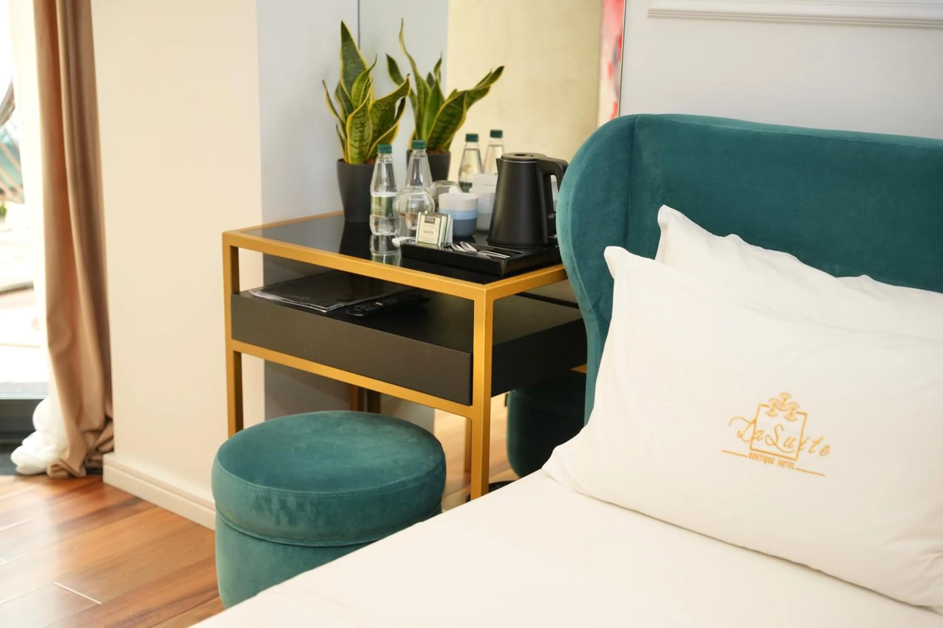 Bed in La Suite Boutique Hotel